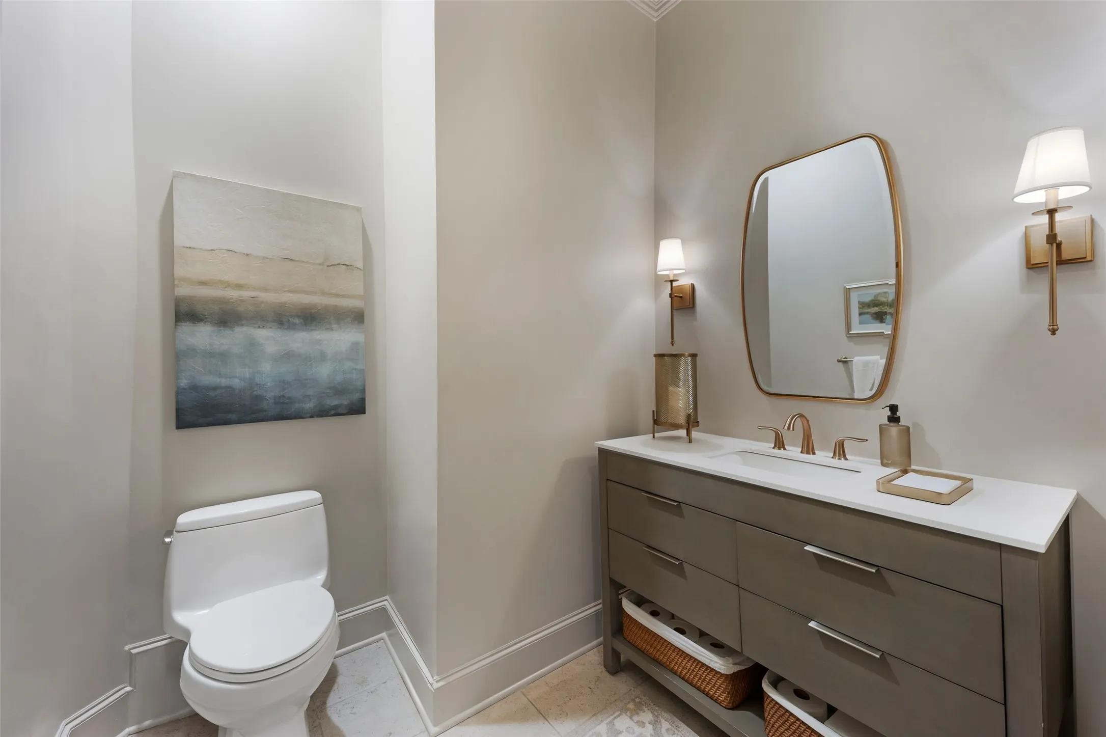 Updated 1st floor guest powder bath is situated in a private hall in between the kitchen, dining and family room.