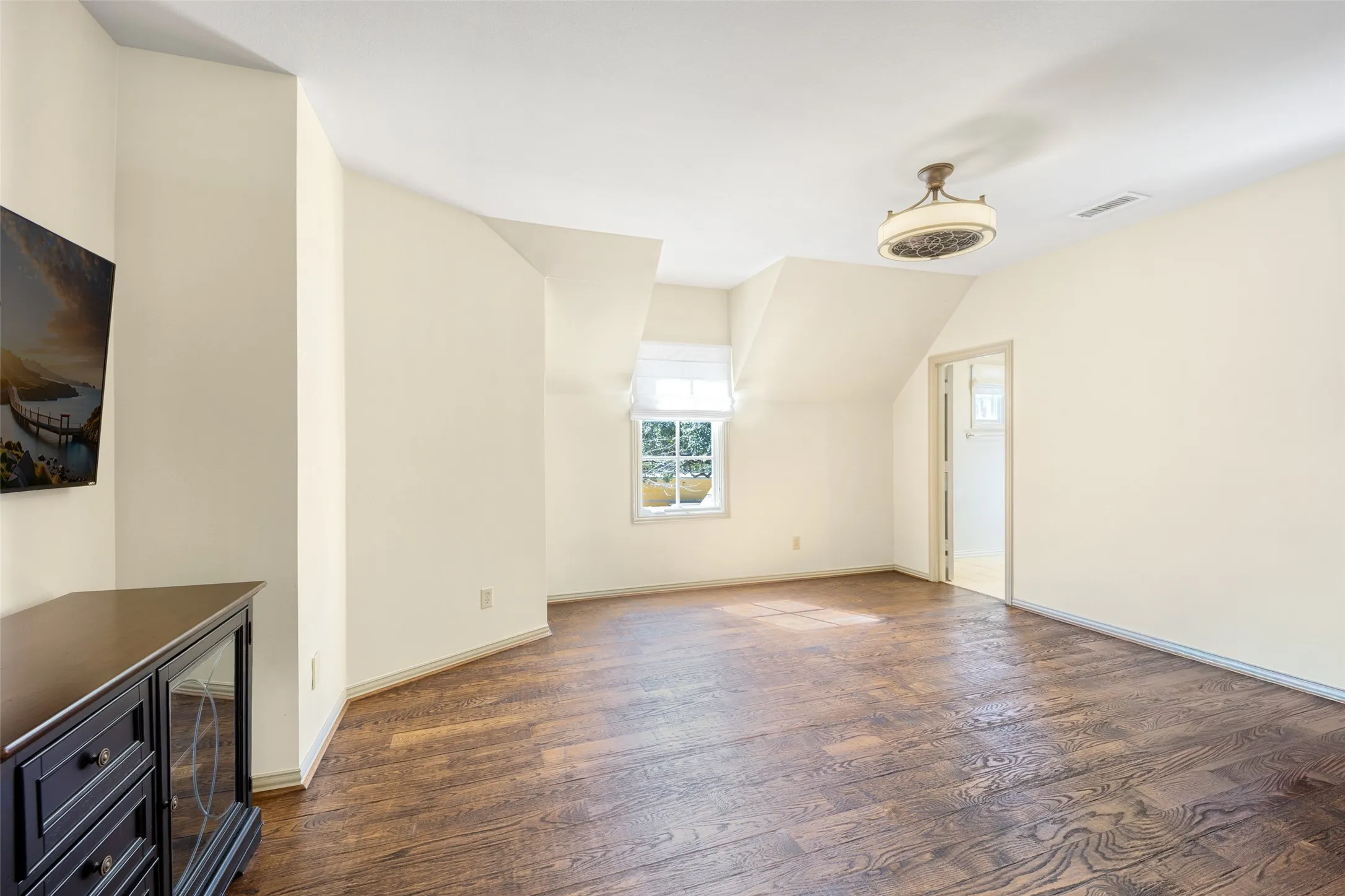 One of the 4 upstairs bedrooms was used as a dance studio with one mirrored wall, hardwood floors, the mirror can easily be removed. An ensuite bath has been updated.