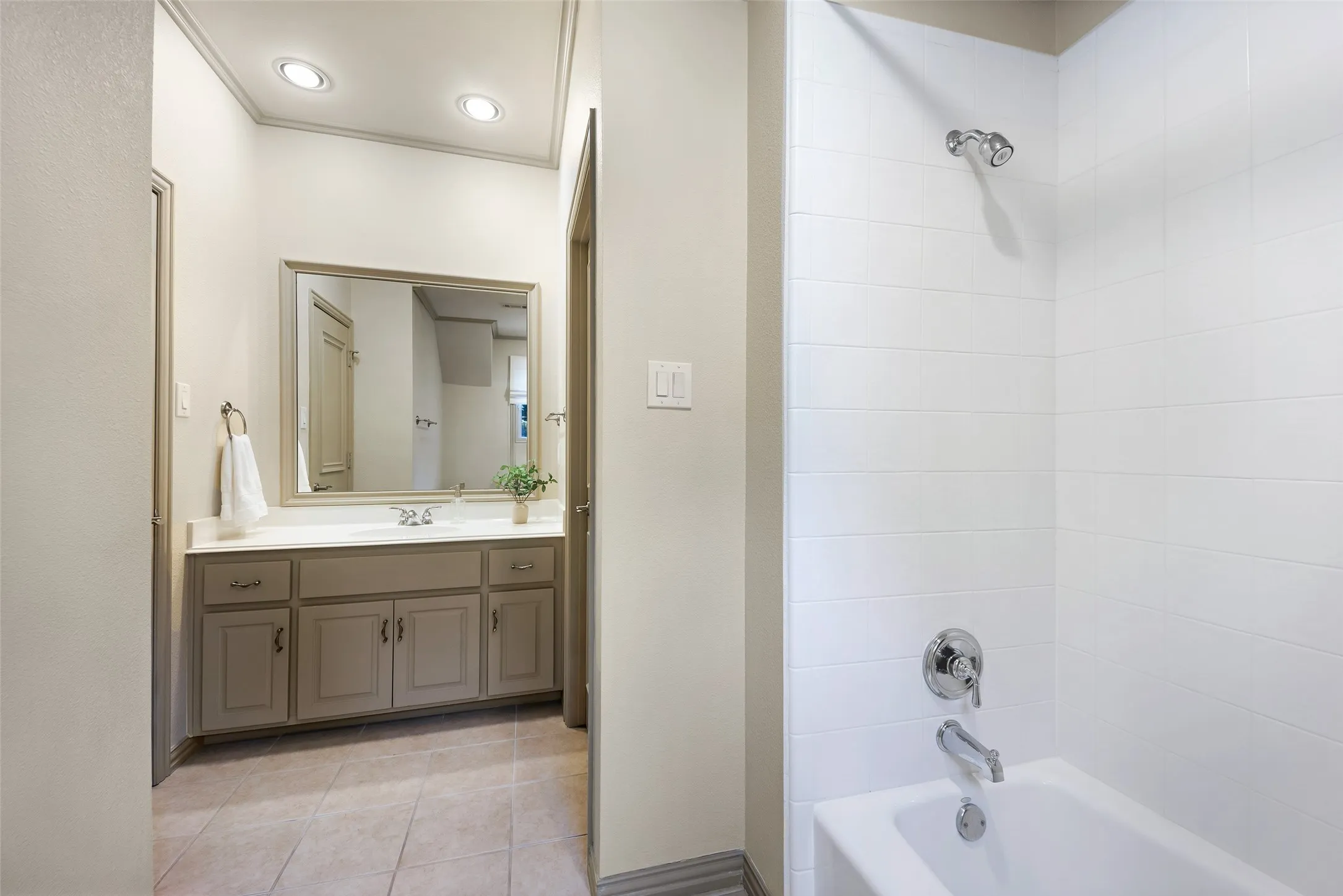 Each en-suite bathroom has been updated with neutral paint, updated fixtures and has an unexpectedly large walk-in closet.