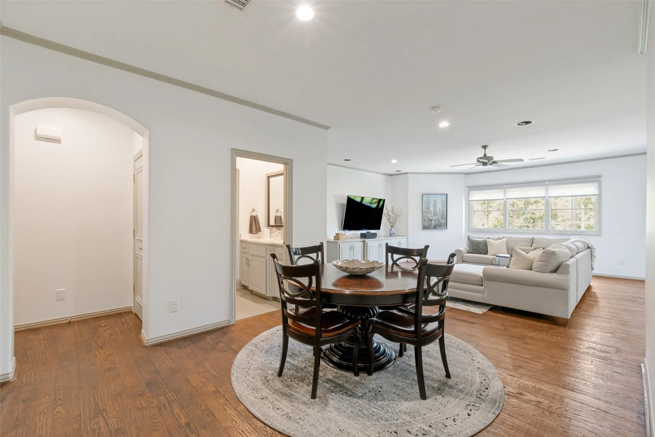 Upstairs game room with room for game table or casual dining. Updated guest bath, media closet with ample storage , remote blinds, and attic access. 2 Bedrooms are accessible off game room.