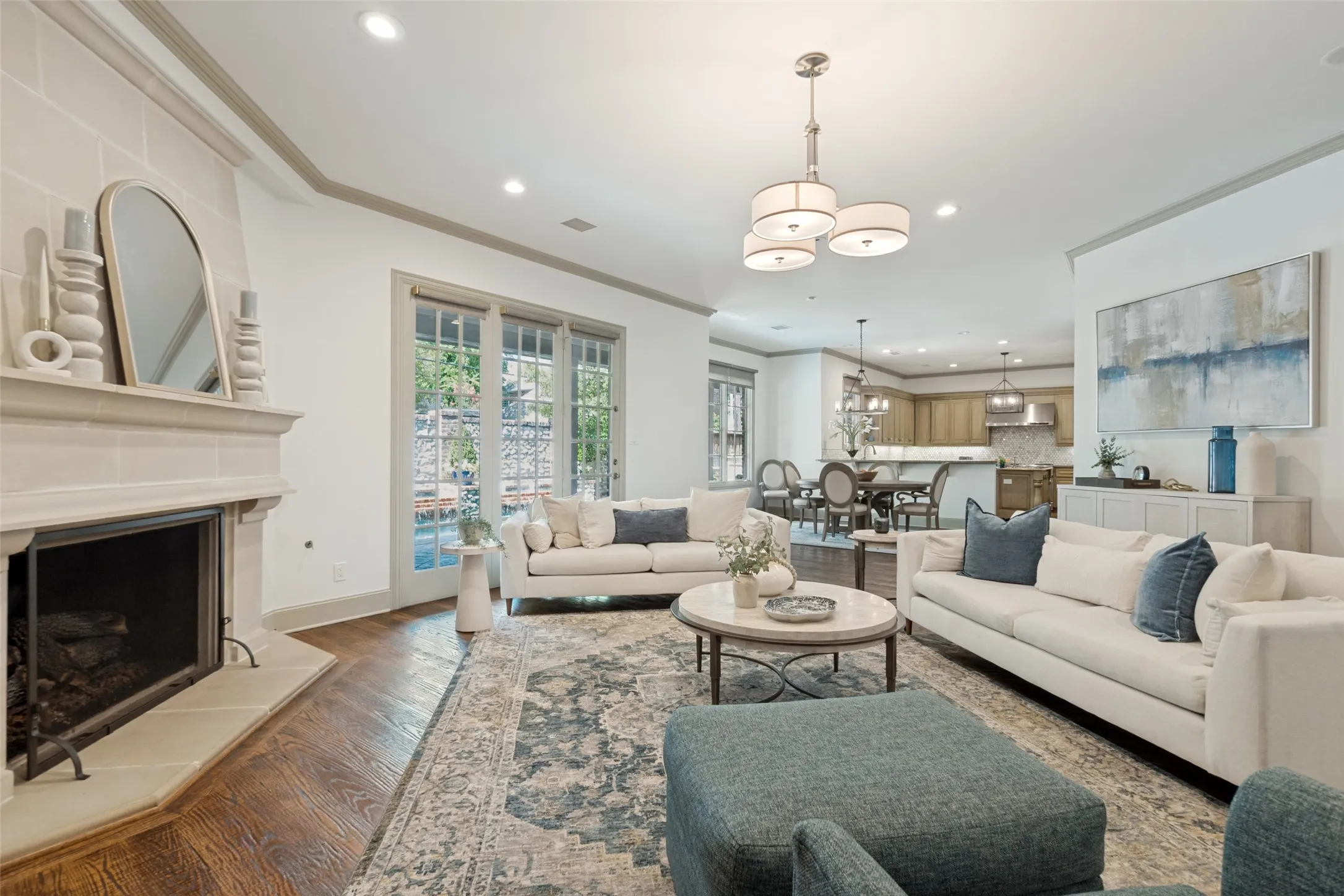 The family room opens to the breakfast room, kitchen, bar and wine room. It is definitely the heart of the home.