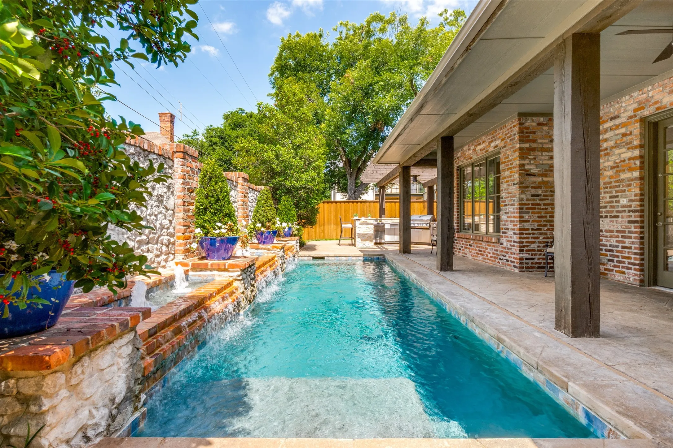 The current owners replaced the tile and the plaster, added a heater stained the deck and added pergola and outdoor kitchen. All work and maintained weekly by Miller's Pools