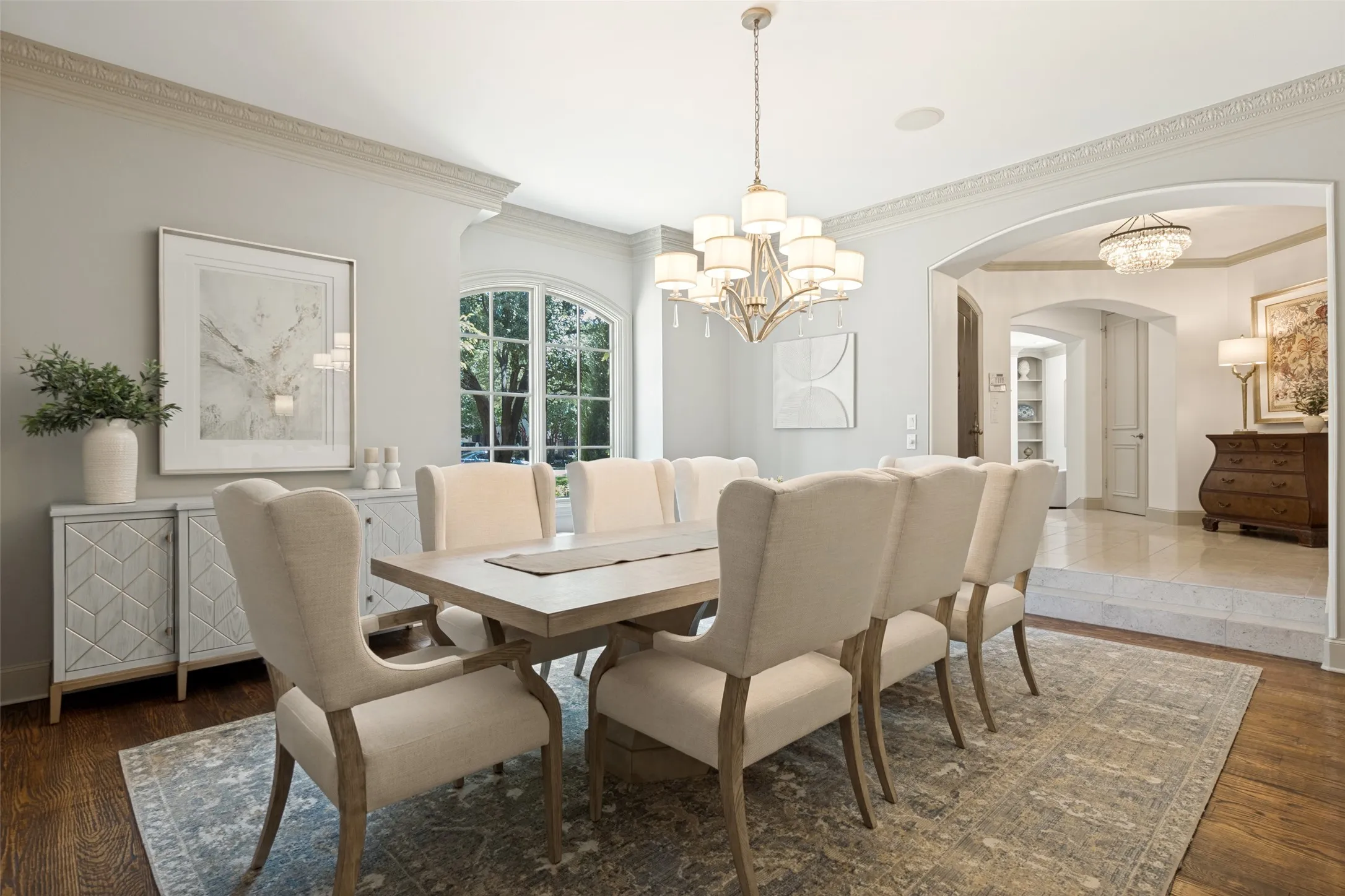 Whether intimate dinner parties or large holiday celebrations, this dining room with two, adjacent butler pantries and nearby bar, is updated and ready for the next event.