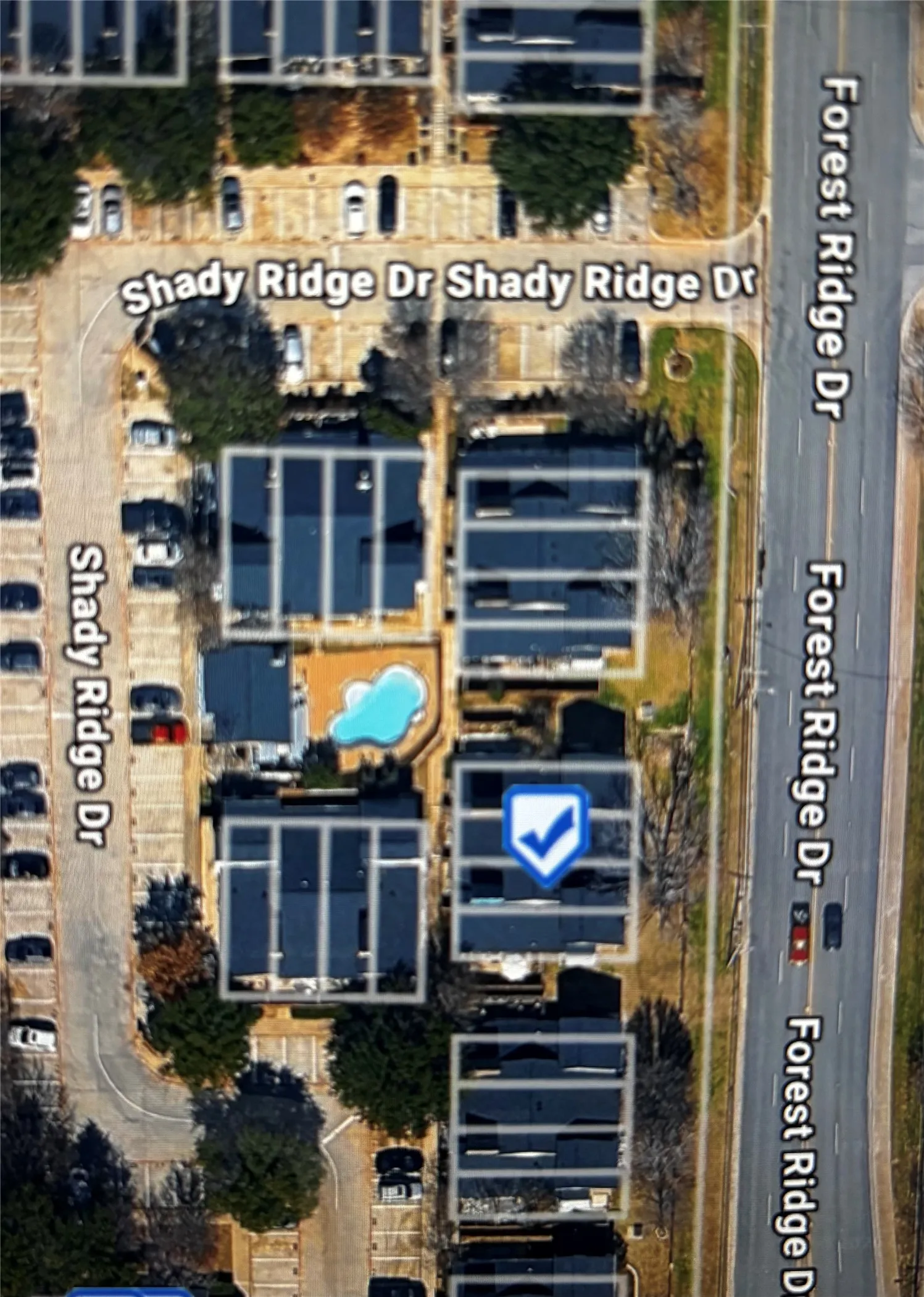 located behind the pool
