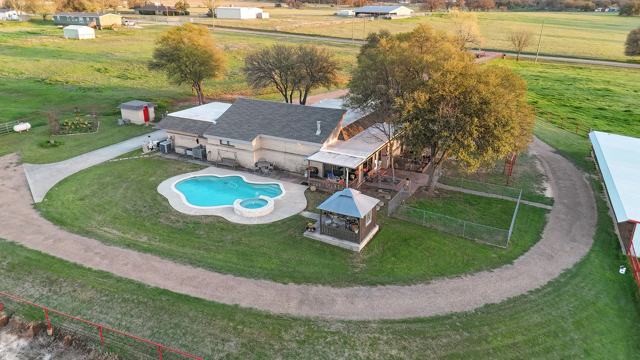 View from above of property featuring a pool area
