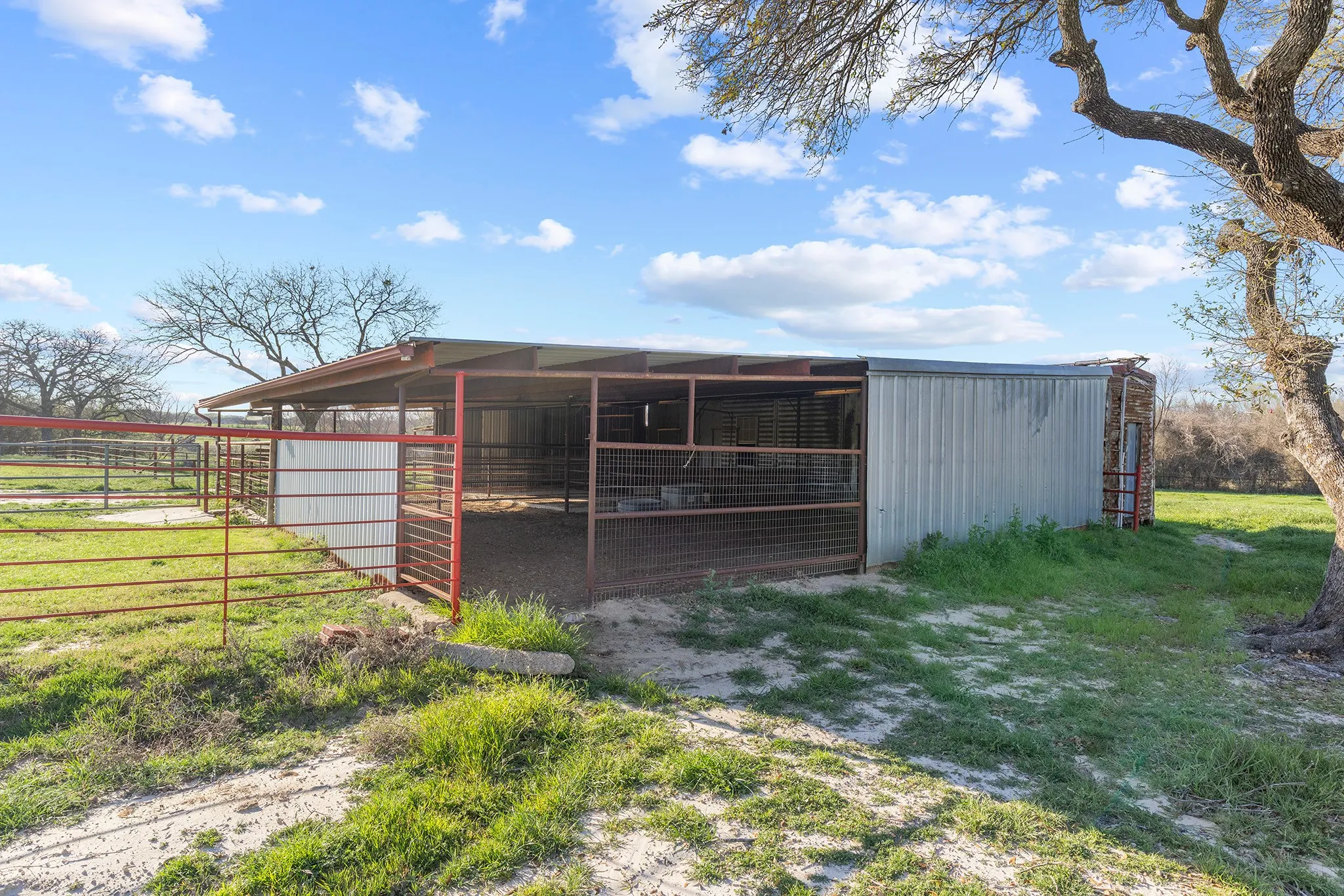 View of outbuilding with an exterior structure