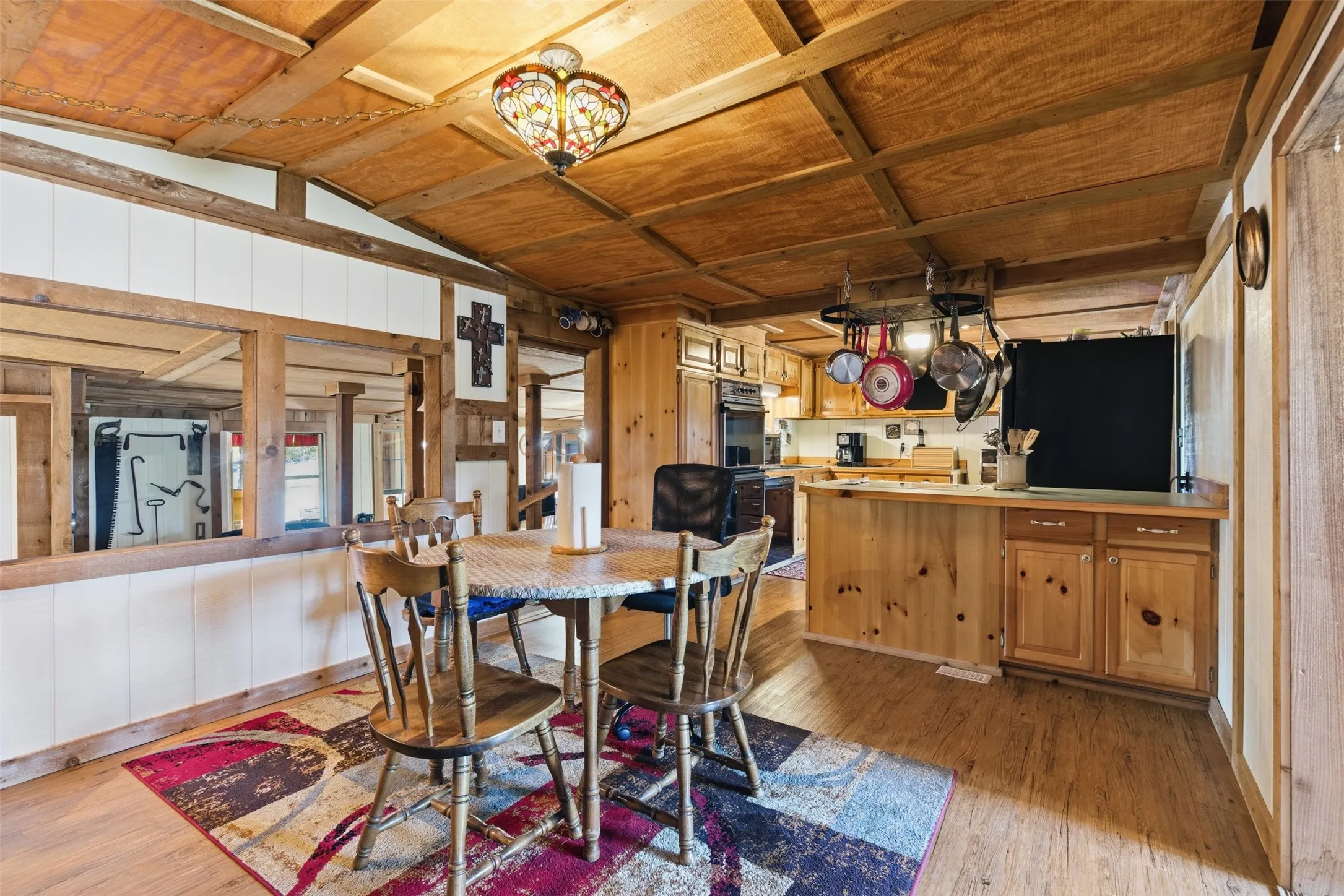 Dining area conveniently located between the kitchen and living spaces.