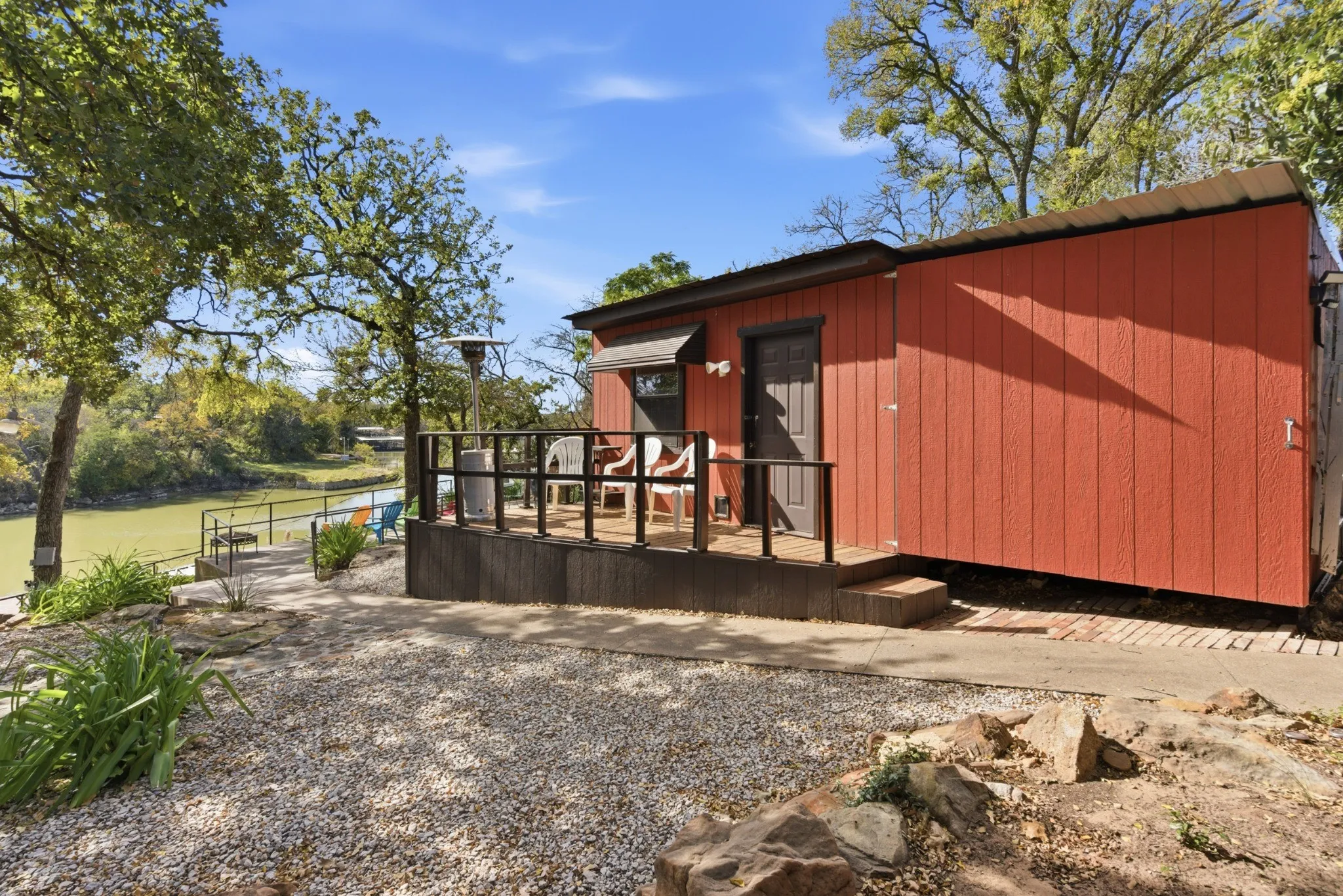 Detached workshop with electricity, heat and a/c provides workspace and storage.
