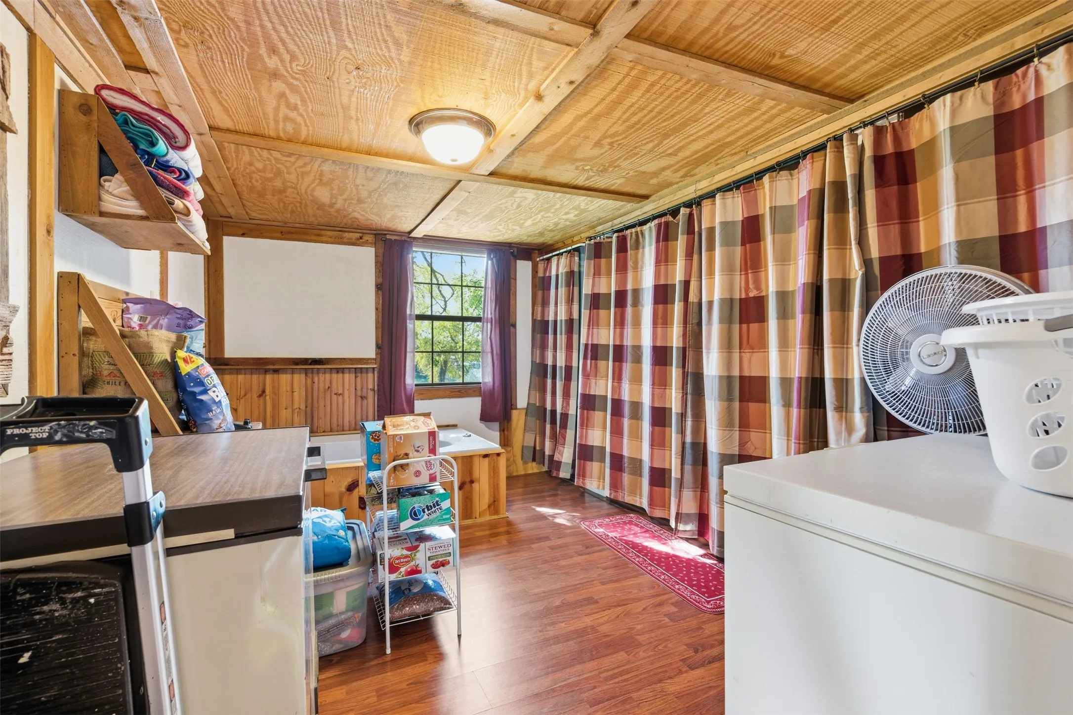 Utility room with laundry and tons of household storage space.