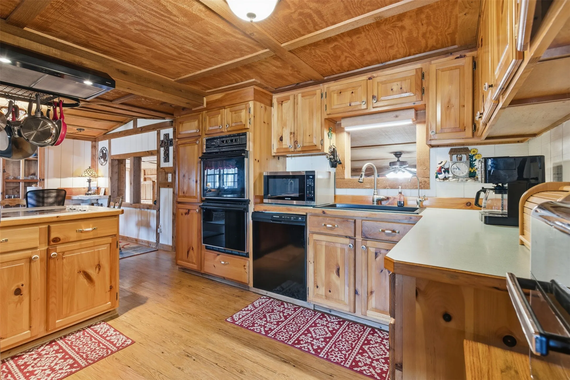Kitchen with extensive cabinetry, generous workspace and double ovens.