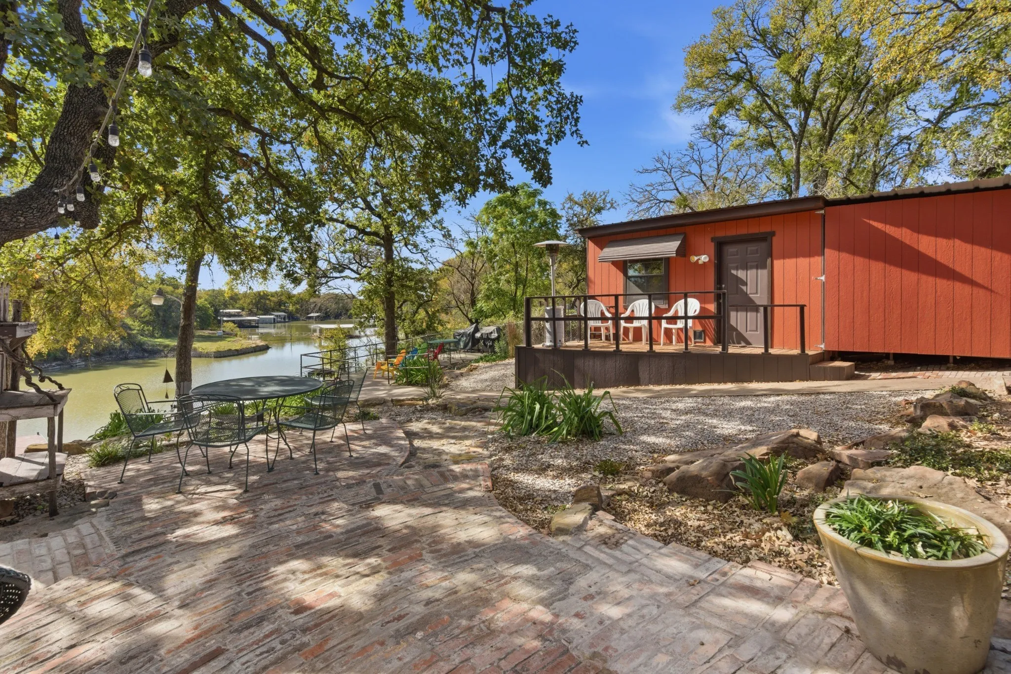 Backyard patio with the lake just steps away.