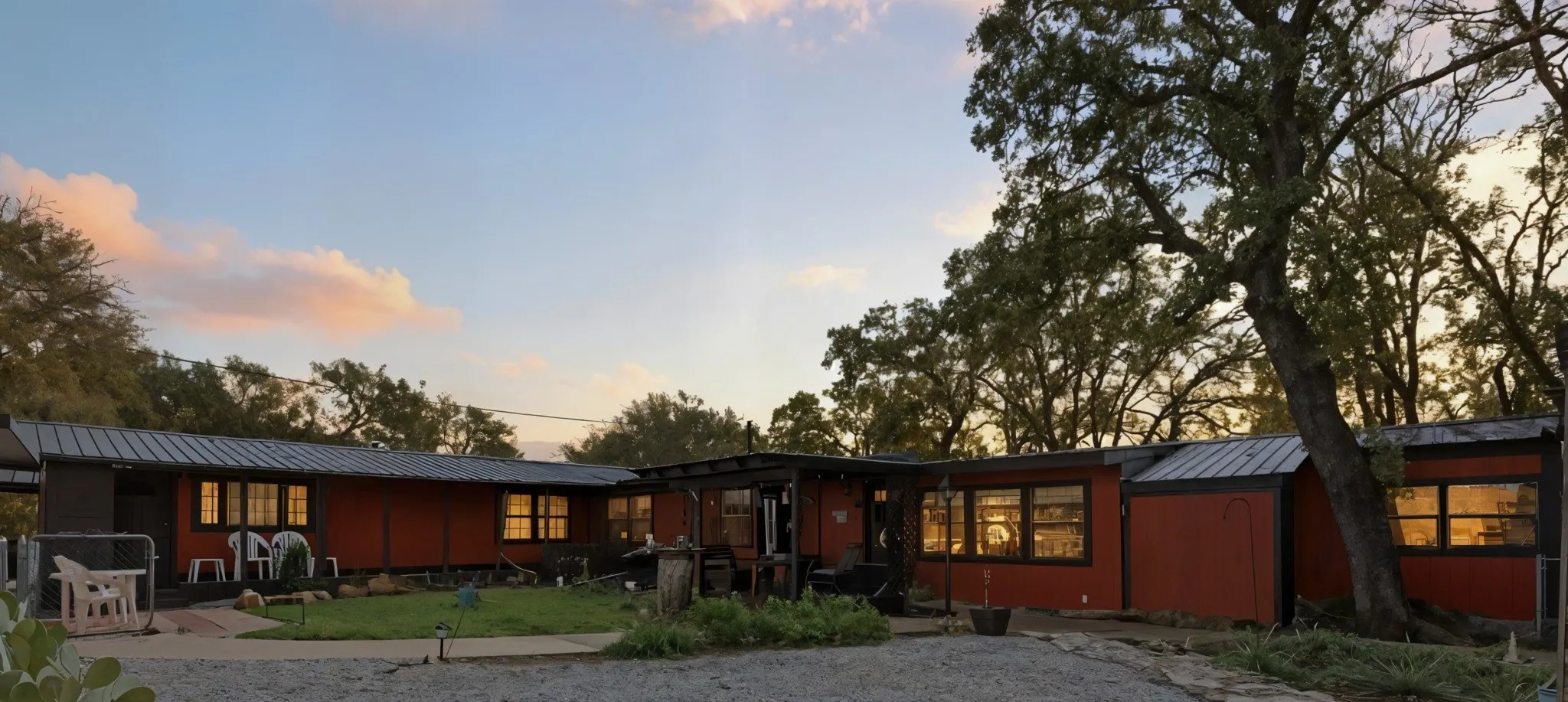 Twilight view of the home and outdoor living spaces.
