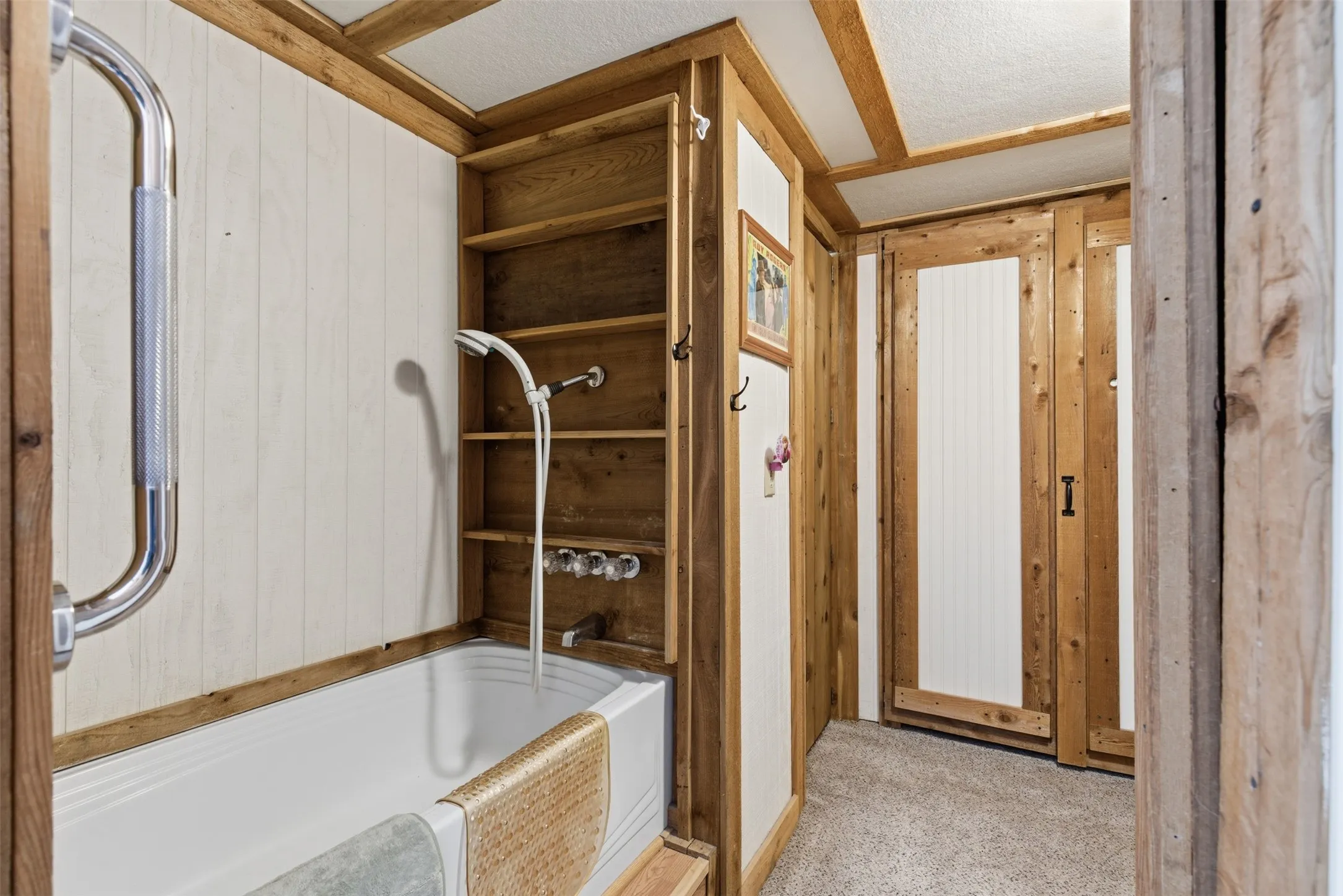 Full en-suite bathroom with tub and shower.