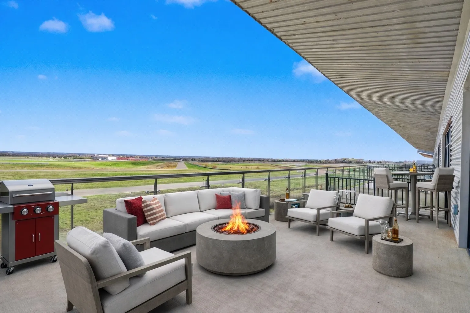 View of patio / terrace featuring an outdoor living space with a fire pit and area for grilling