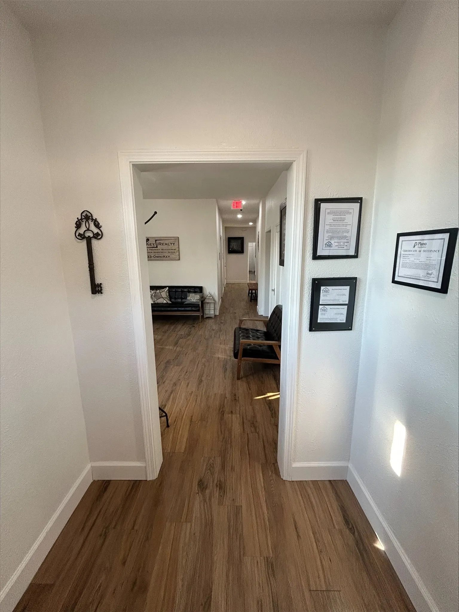 Corridor with dark wood-type flooring