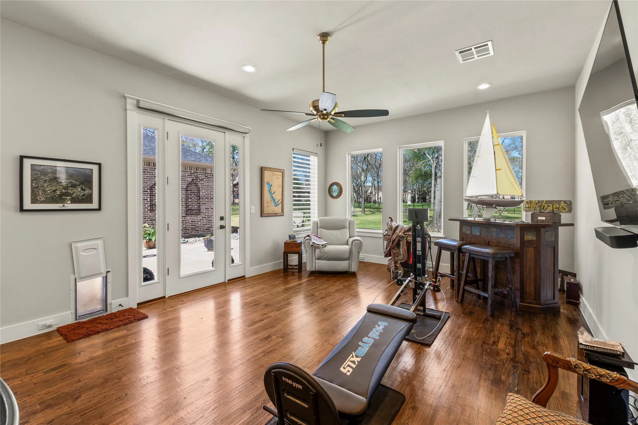 Versatile bonus room with patio access could be 4th bedroom, bunk room, game room, hobby room, exercise room or second living area.