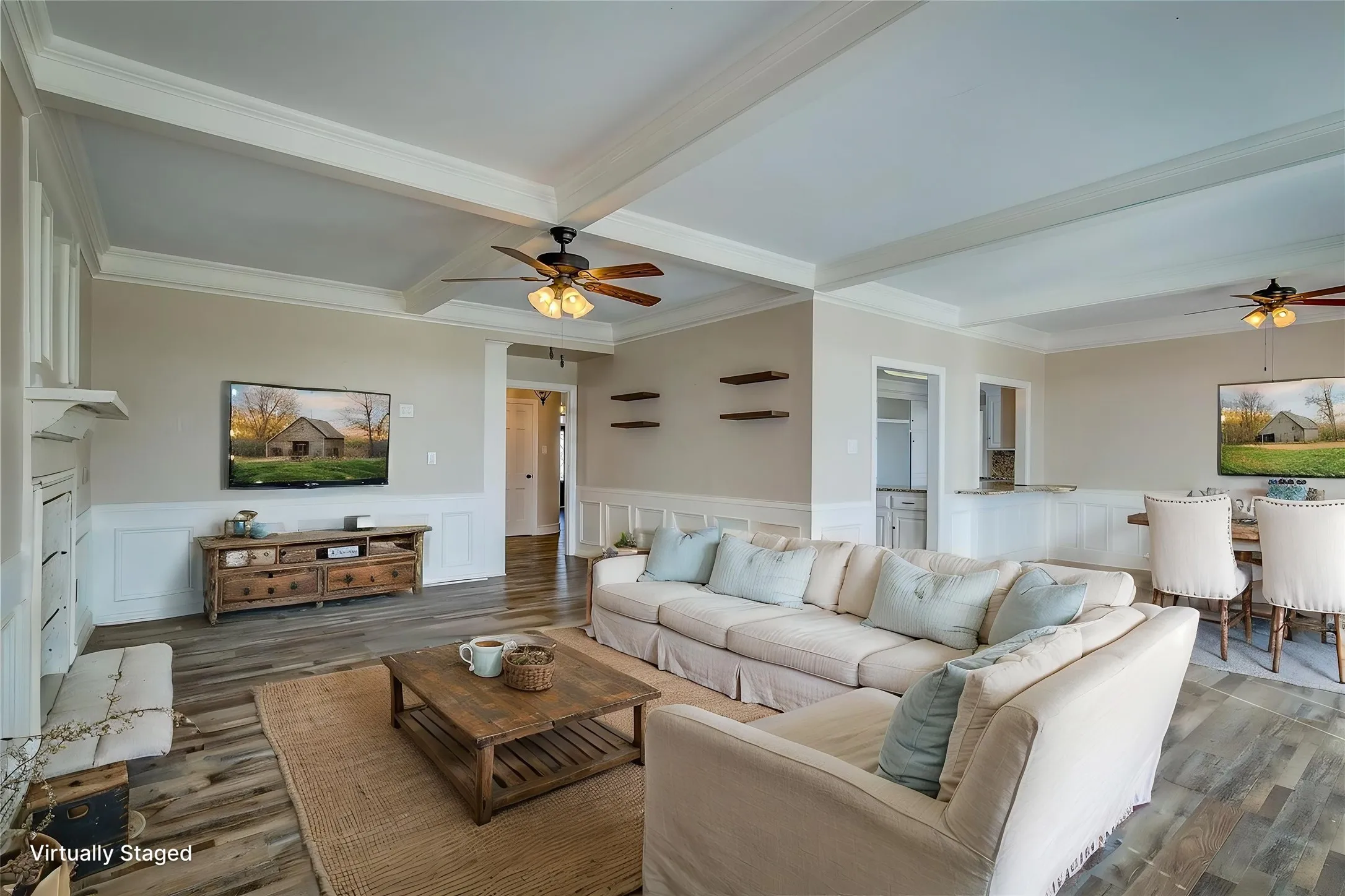 Great room with breakfast area beyond; kitchen is visible.