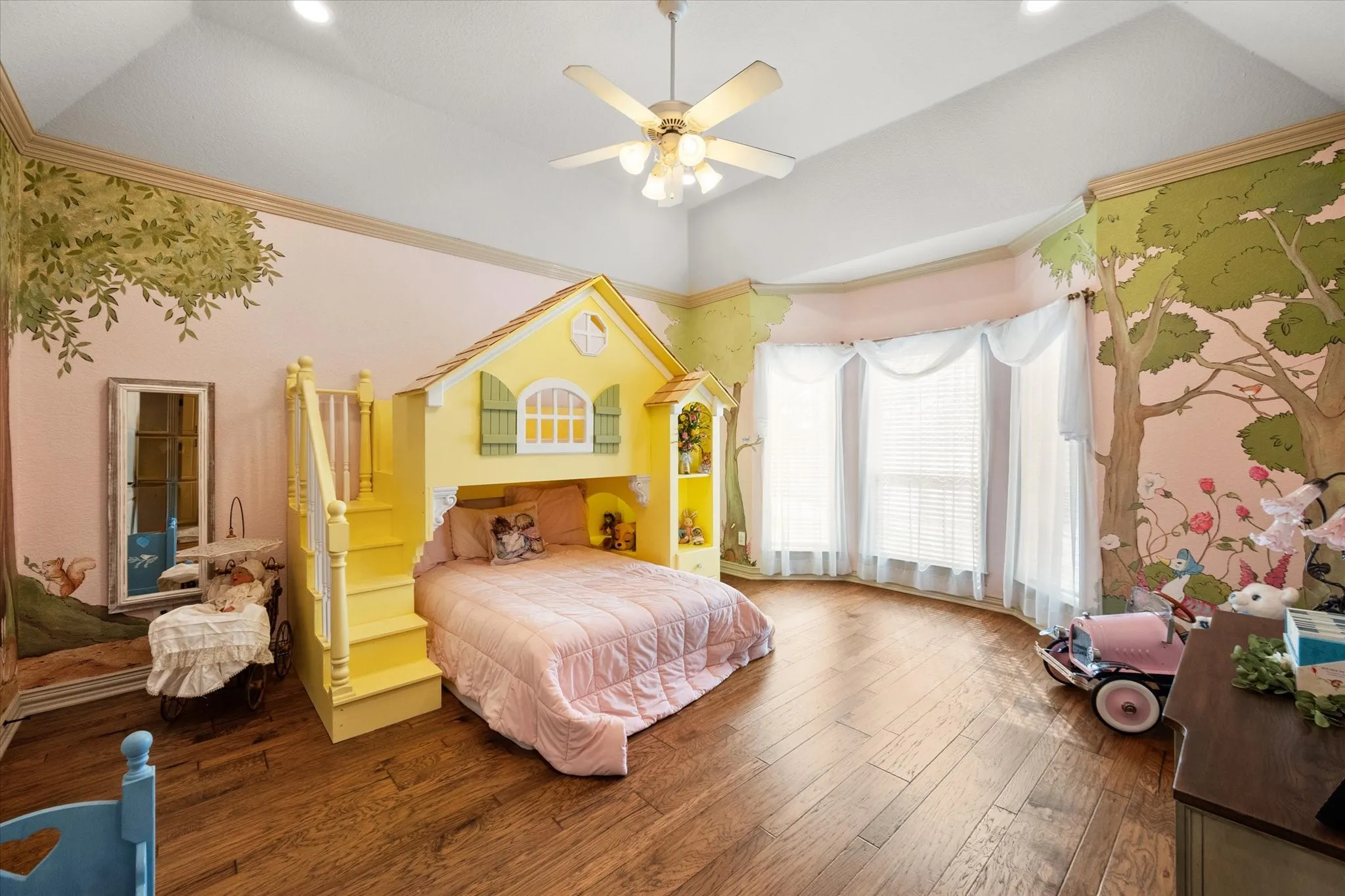 Bedroom with ornamental molding, dark wood-style flooring, ceiling fan, recessed lighting, and vaulted ceiling
