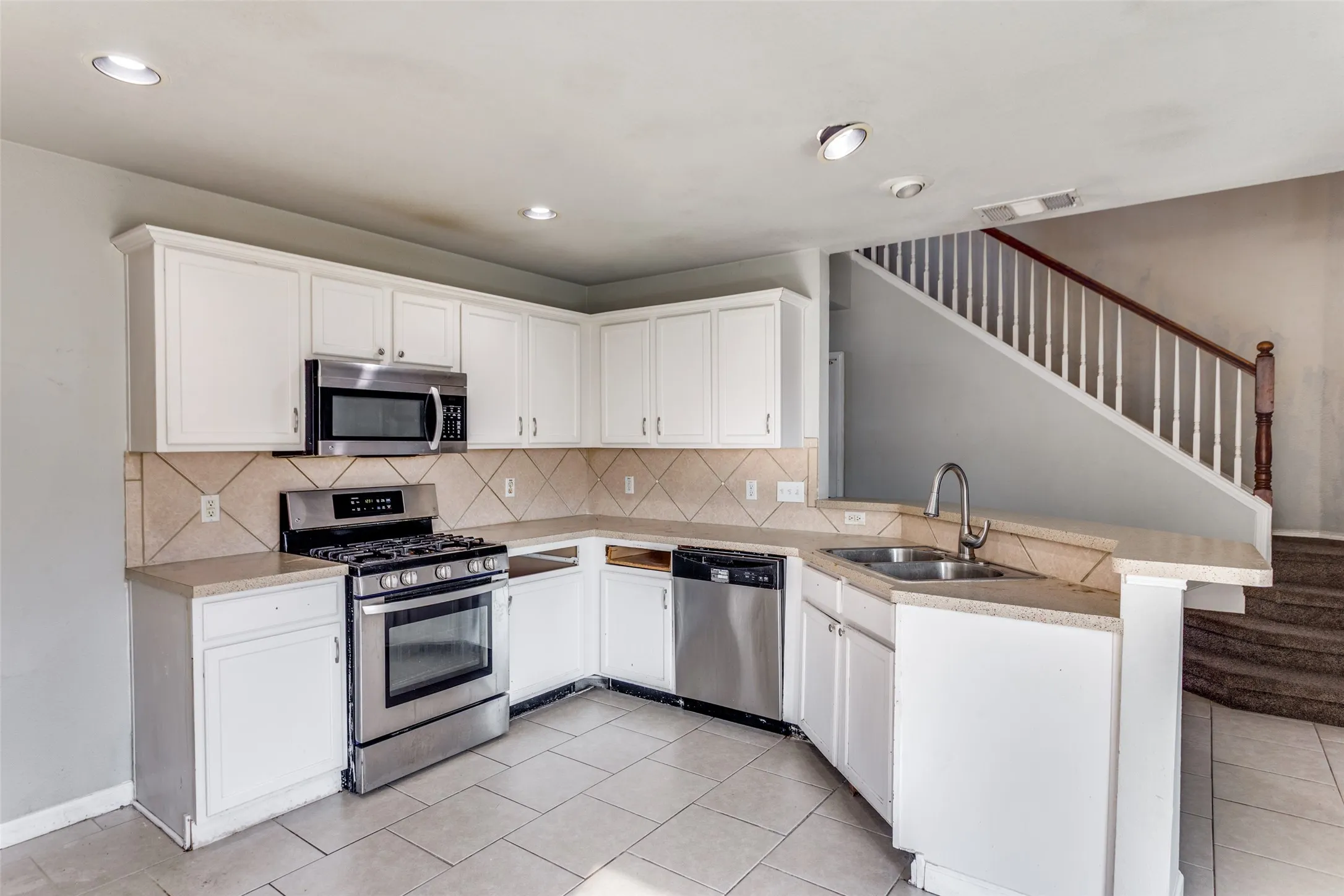Great storage, gas range and space for a little island as well.