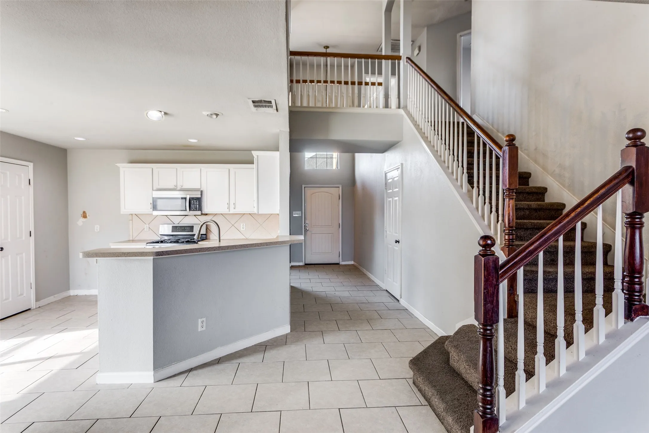 A spacious kitchen with great storage space.