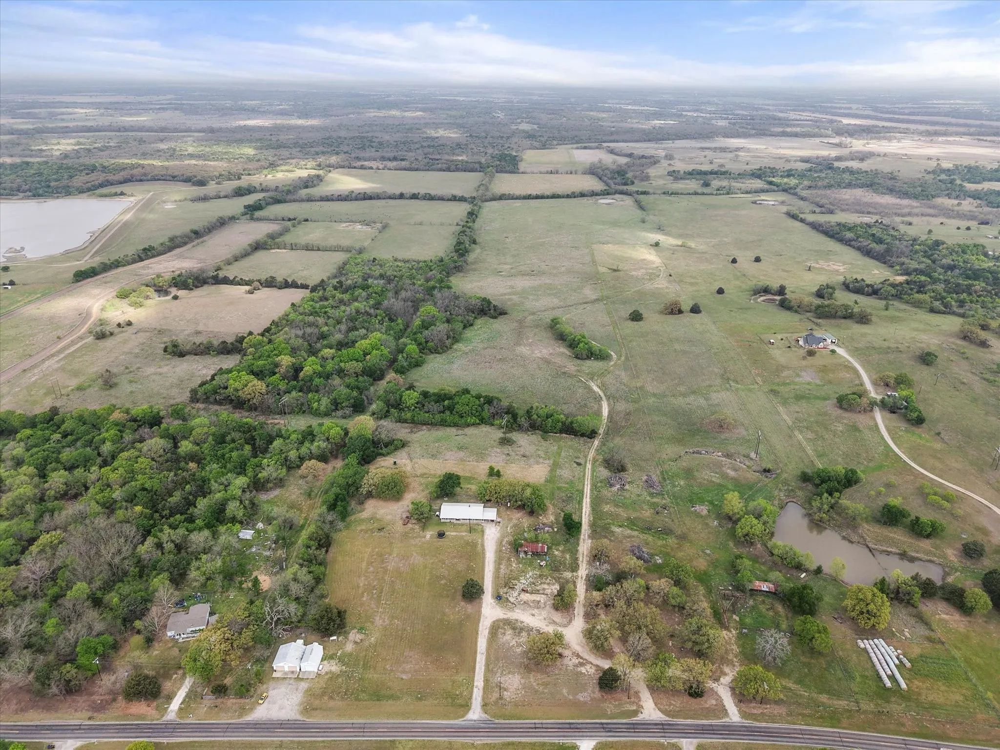 Aerial view of sparsely populated area featuring abundant farmland