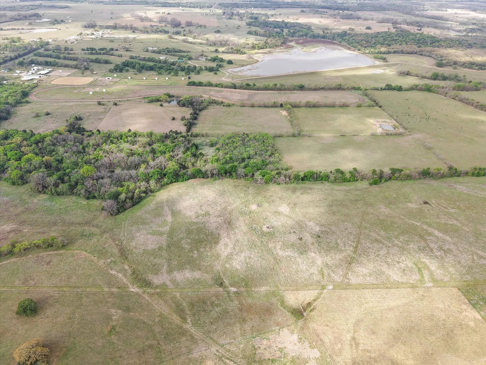 View of rural area featuring rows of crops