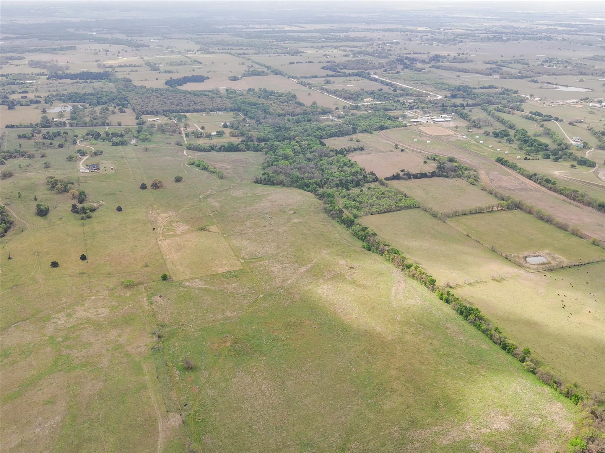 View of property location featuring rural landscape and extensive farmland