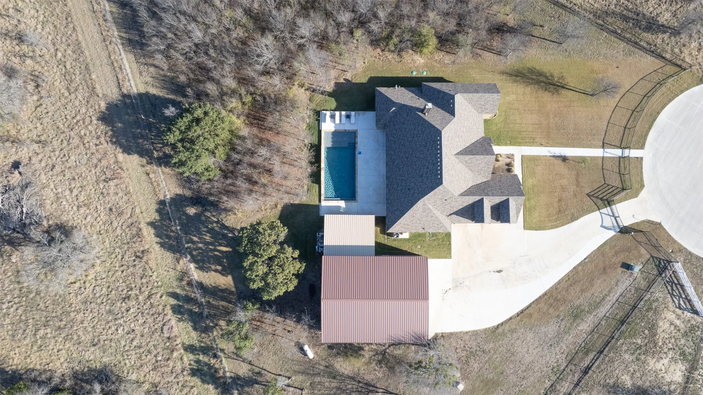 Aerial showing pool & shop