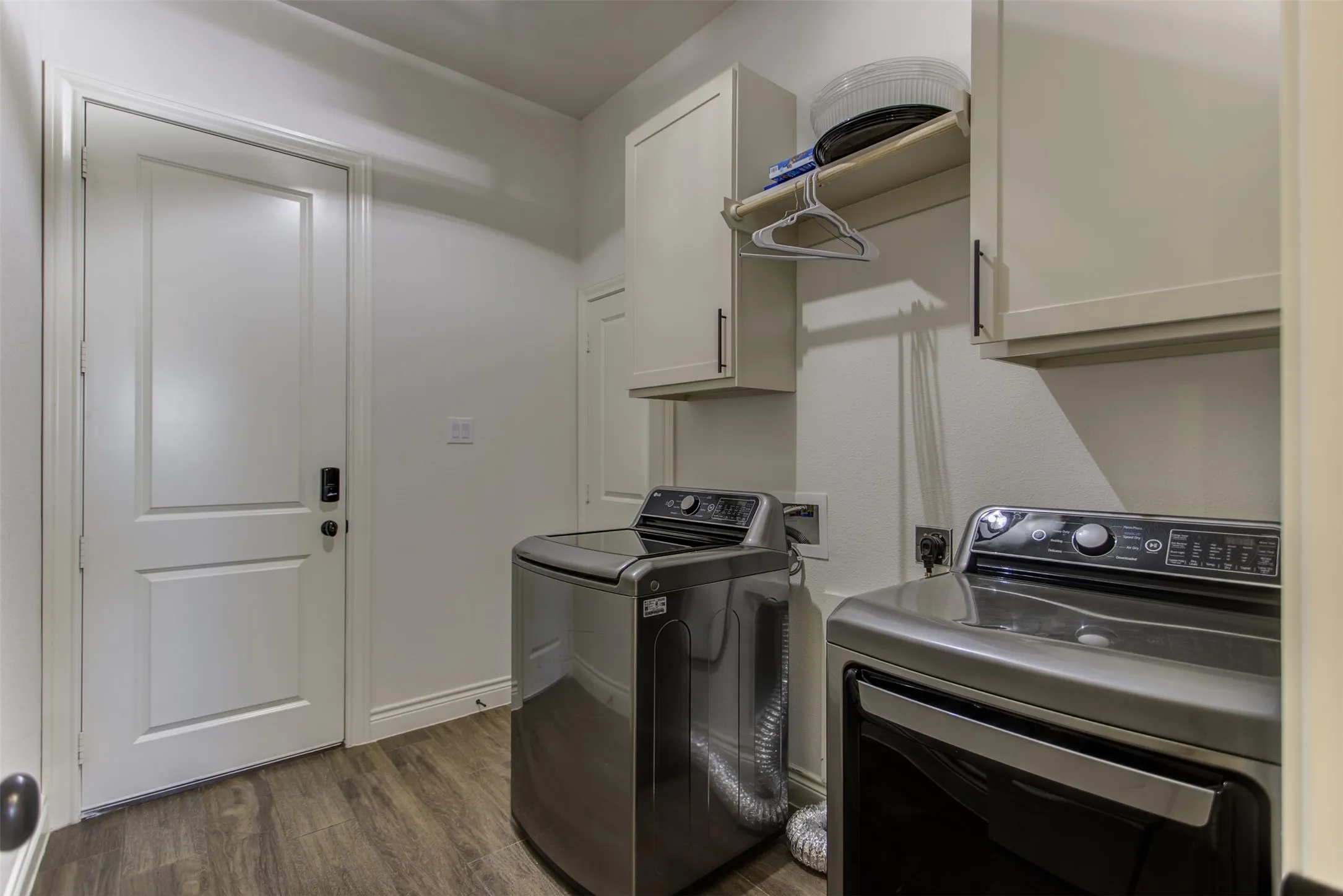 Laundry room is pass-thru from garage