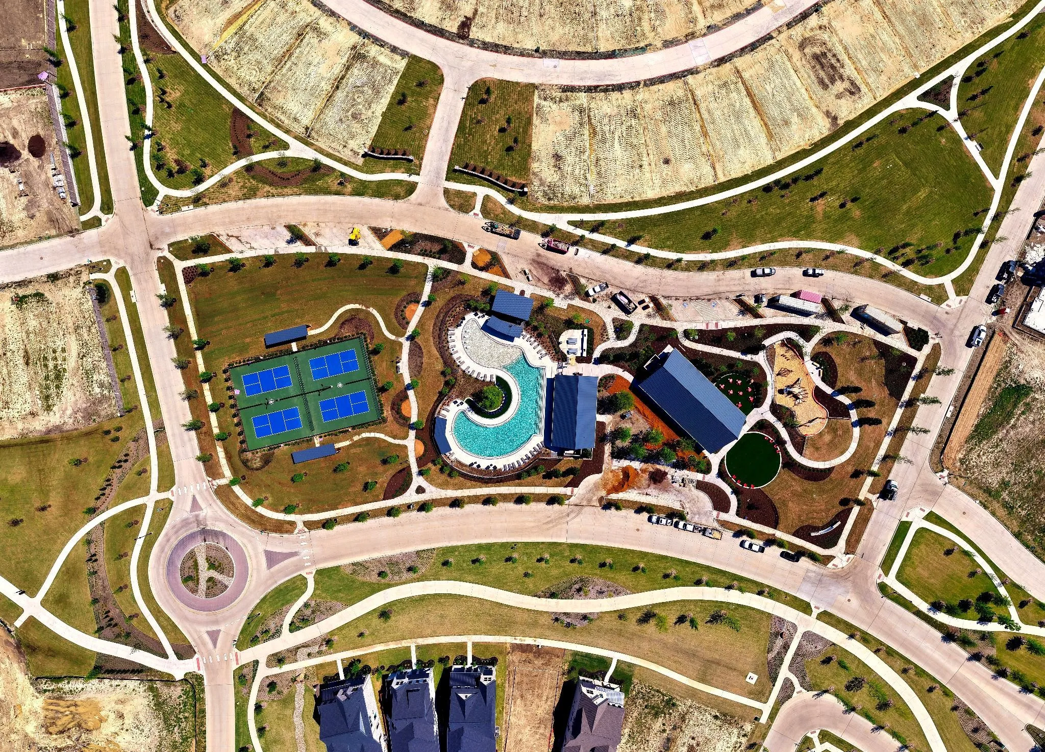 Aerial perspective showcasing a community hub with multiple amenities