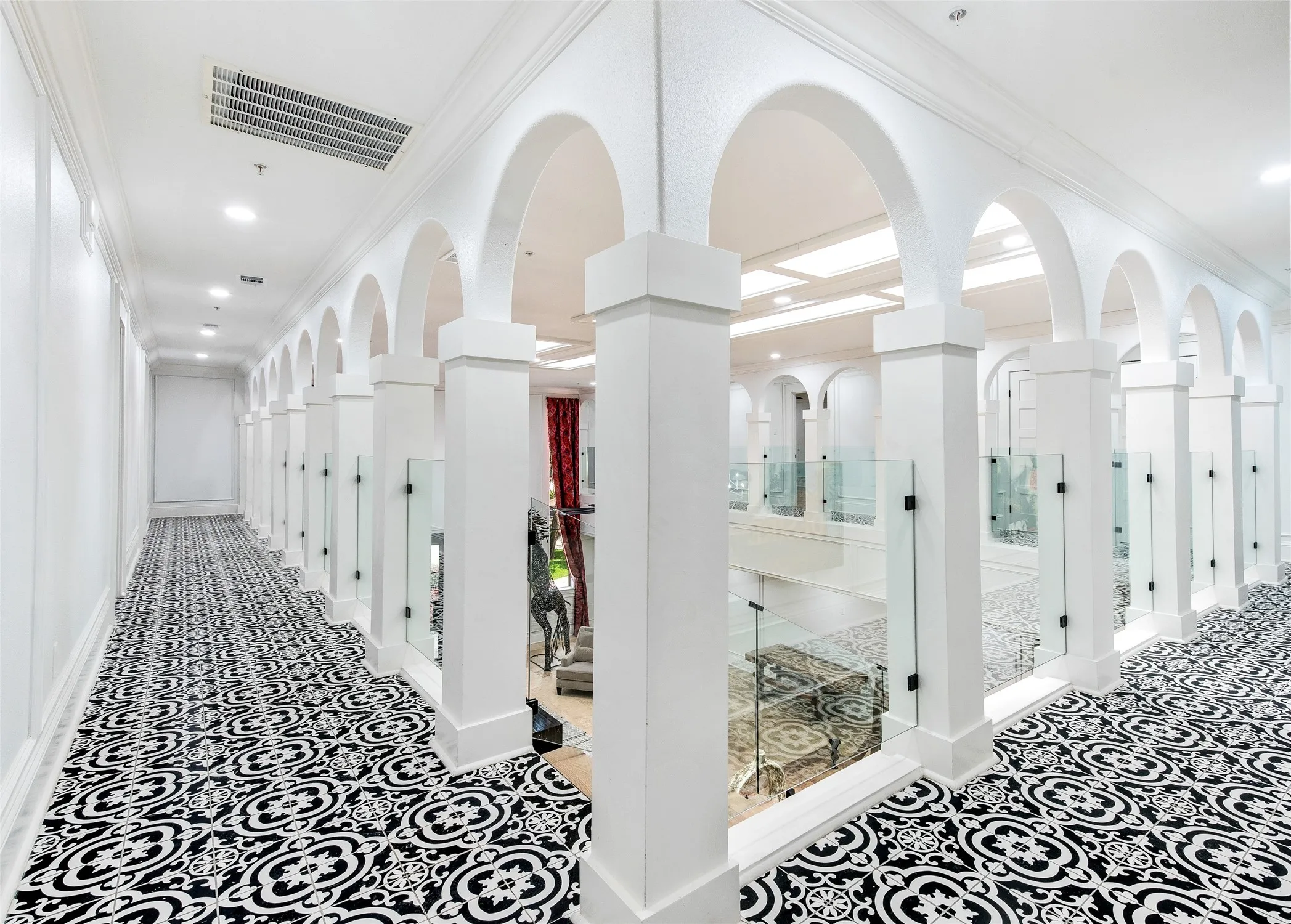 Hallway featuring ornamental molding and recessed lighting