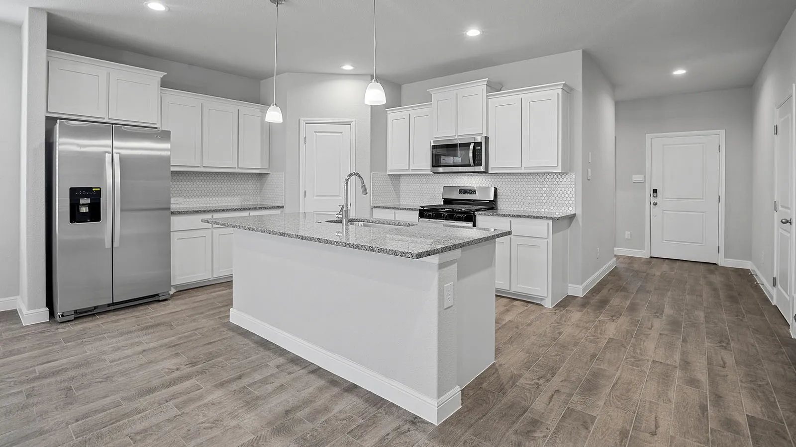 Kitchen-All Home and community information, including pricing, included features, terms, availability and amenities, are subject to change at any time without notice or obligation. All Drawings, pictures, photographs, video, square footages, floor plans, elevations, features, colors and sizes are approximate for illustration purposes only and will vary from the homes as built.