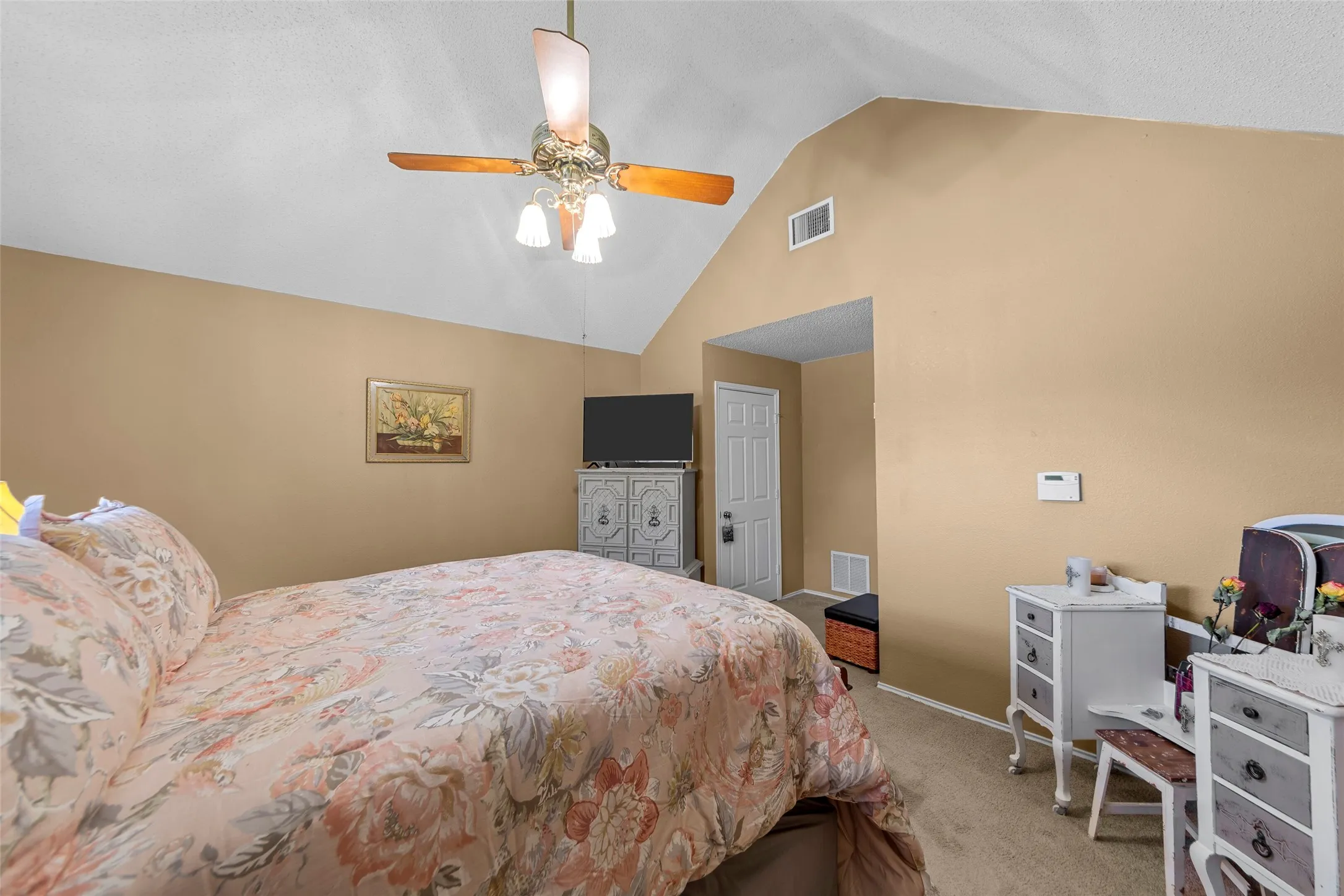 You will love this great spacious and bright primary bedroom!