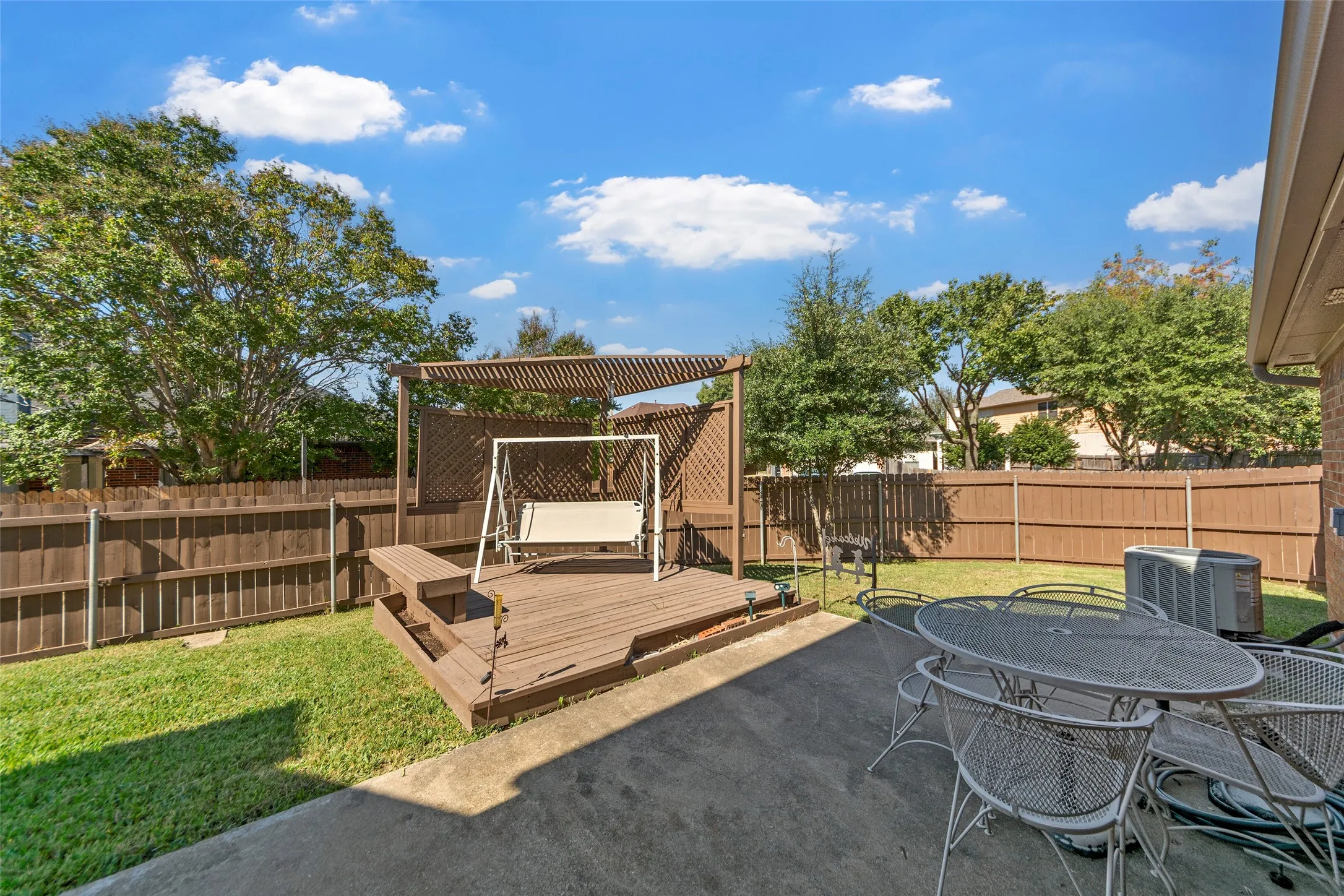 Back yard with a spacious backyard and deck.  It's quiet and one of the largest ones in the neighborhood.