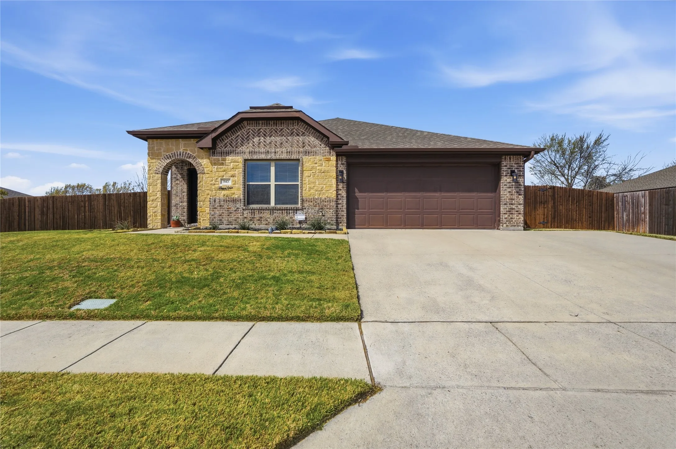 Wonderful brick home with stone accent.