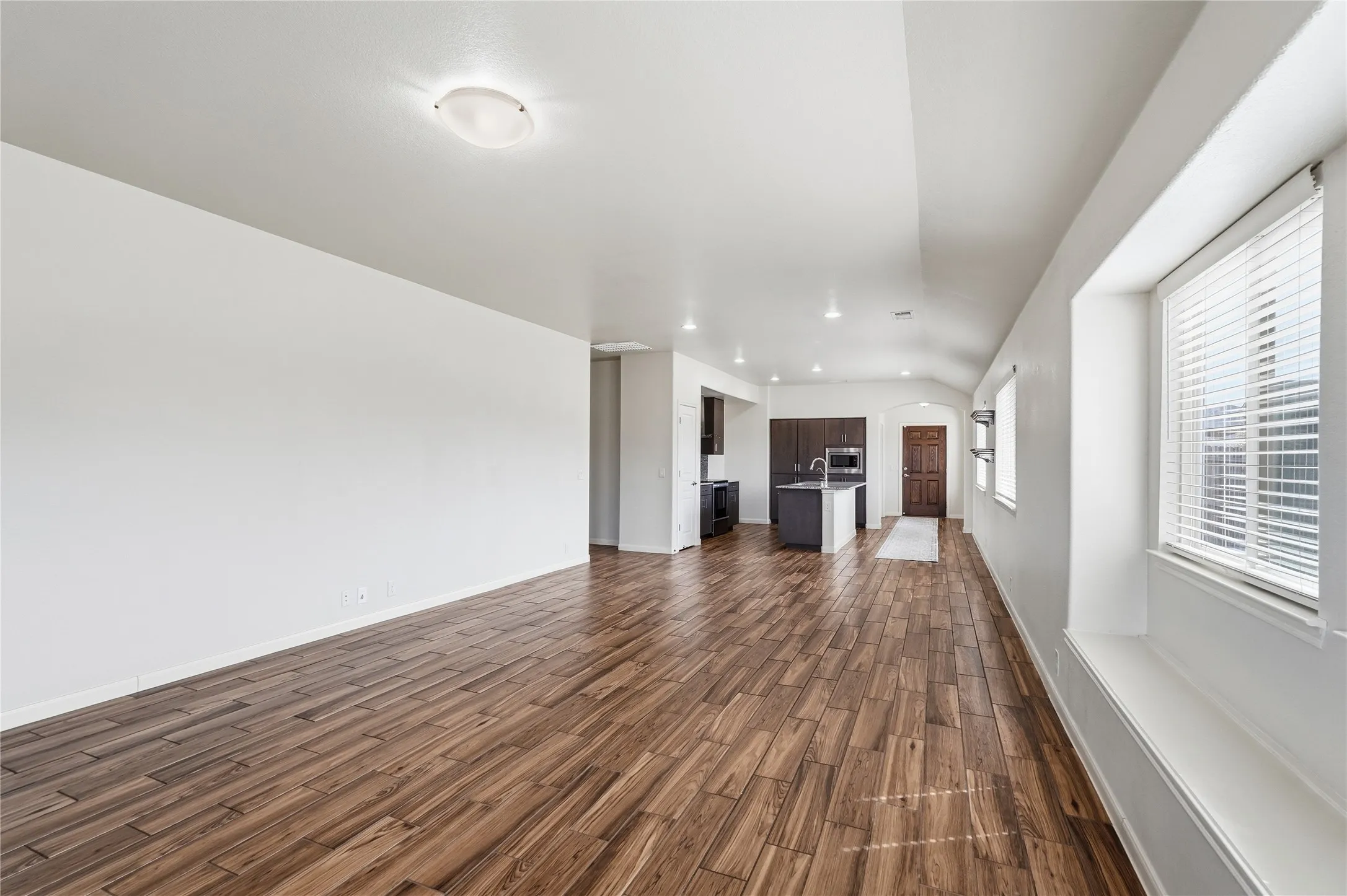 Open plan that highlights beautiful engineered wood floors