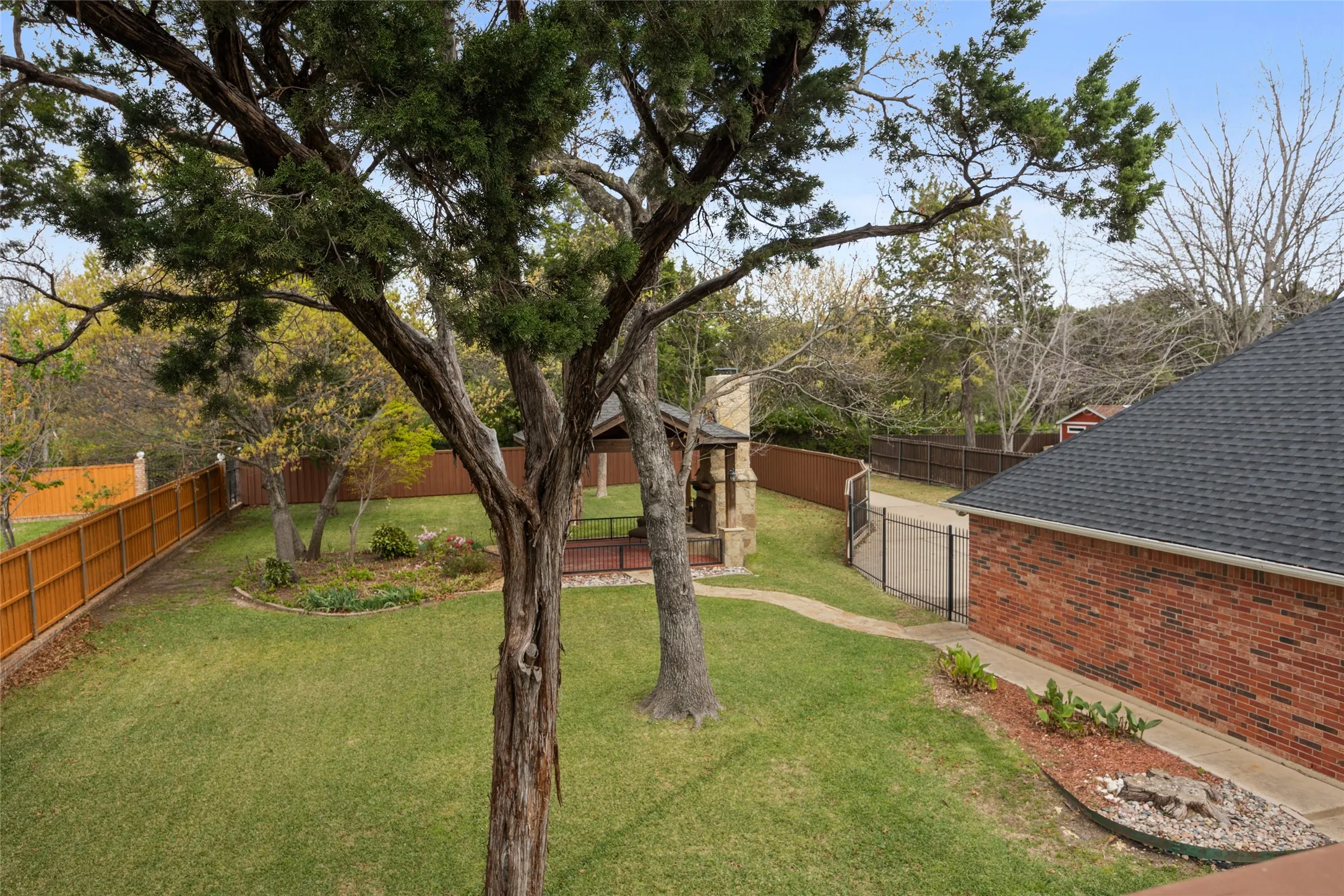View of fenced backyard