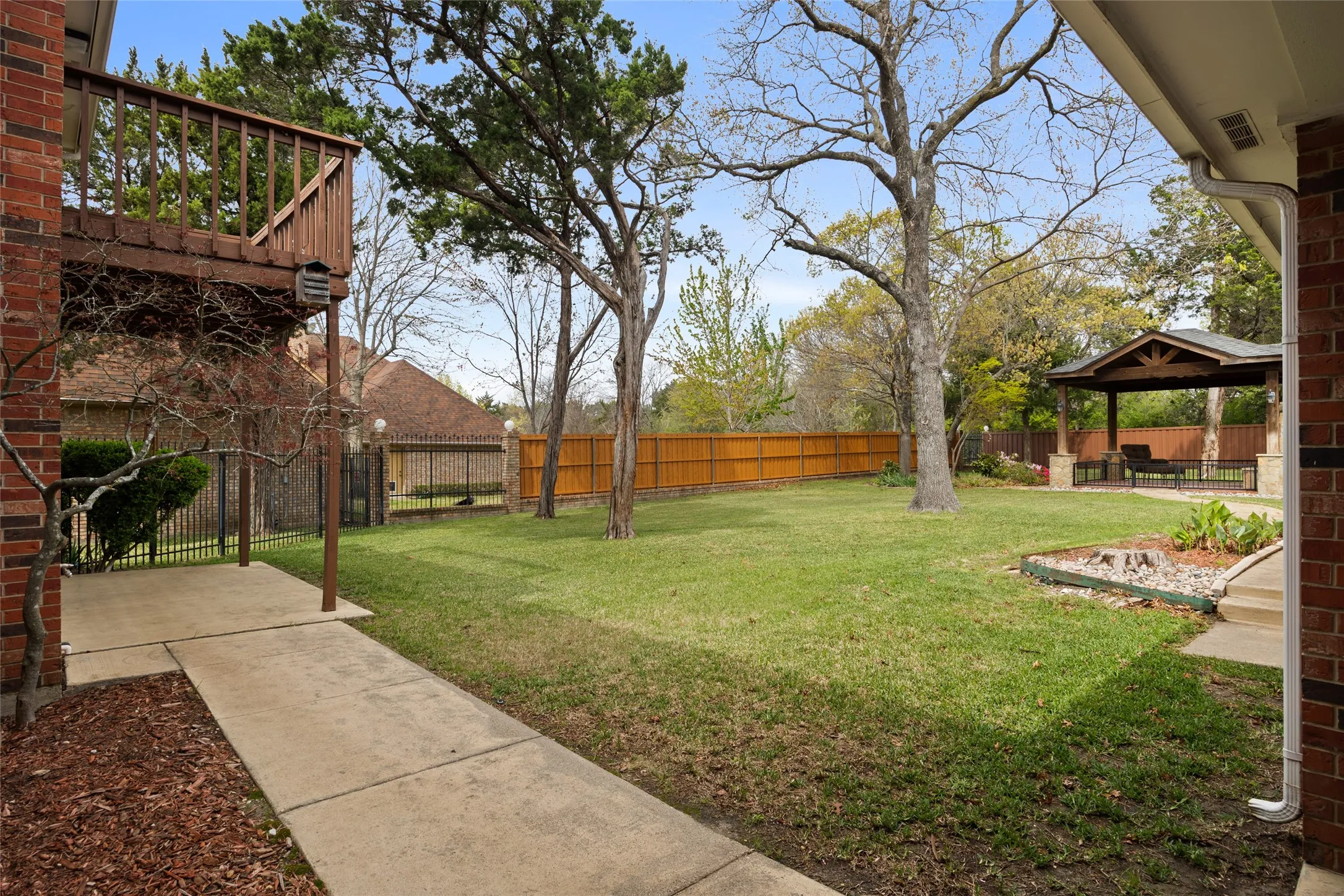 Fenced backyard featuring a patio area