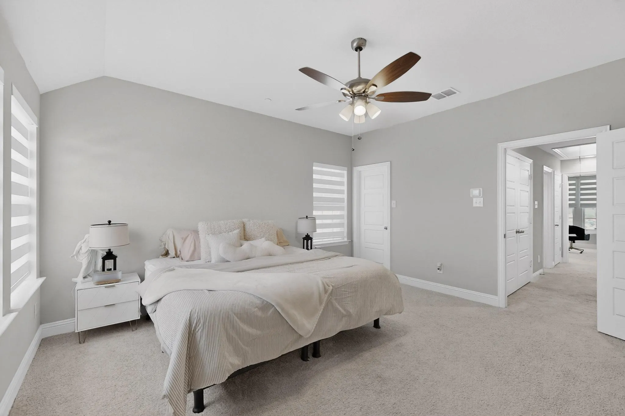 Vaulted primary suite feels twice the size