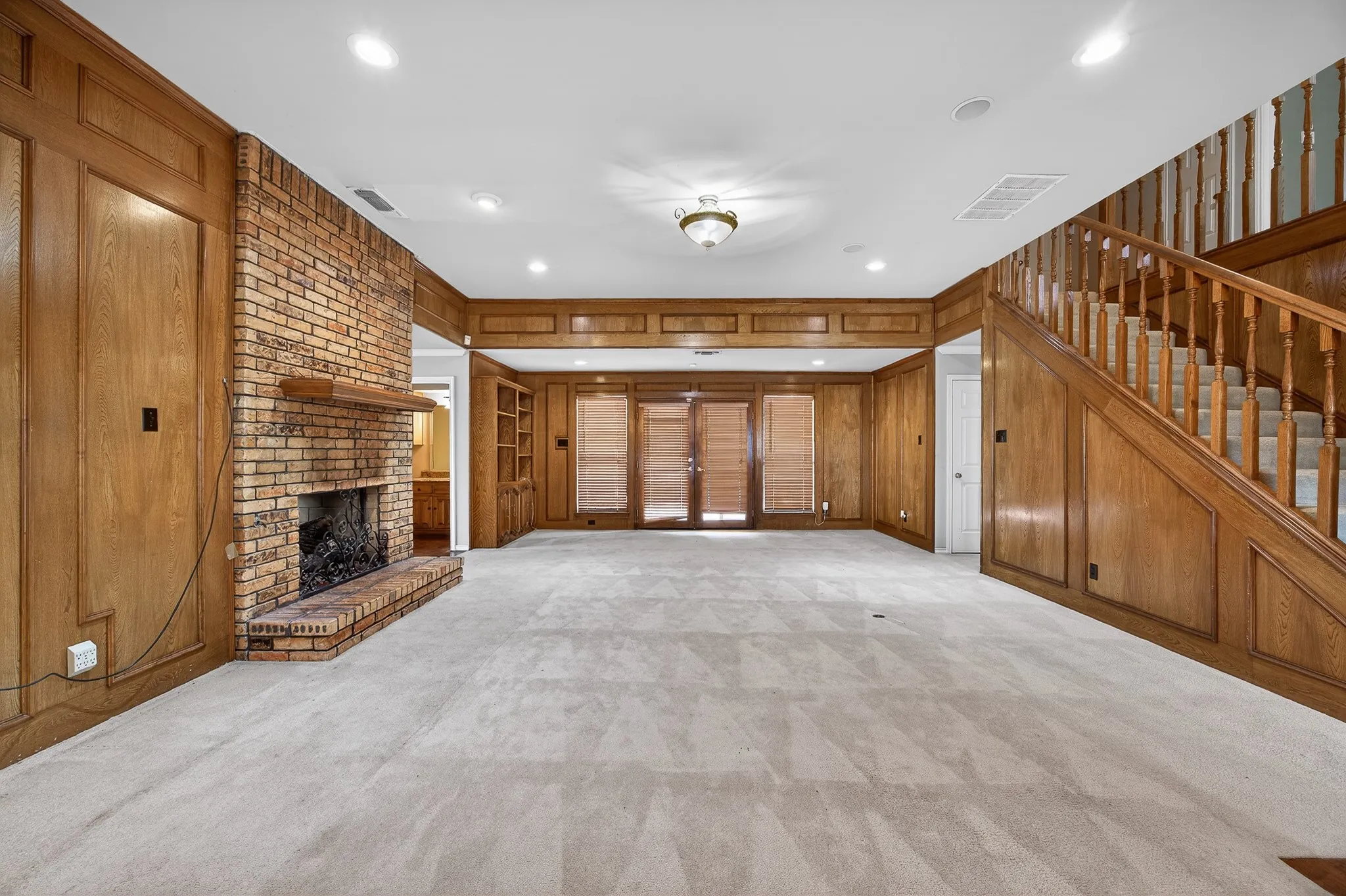 Oversized living room with double sided fireplace