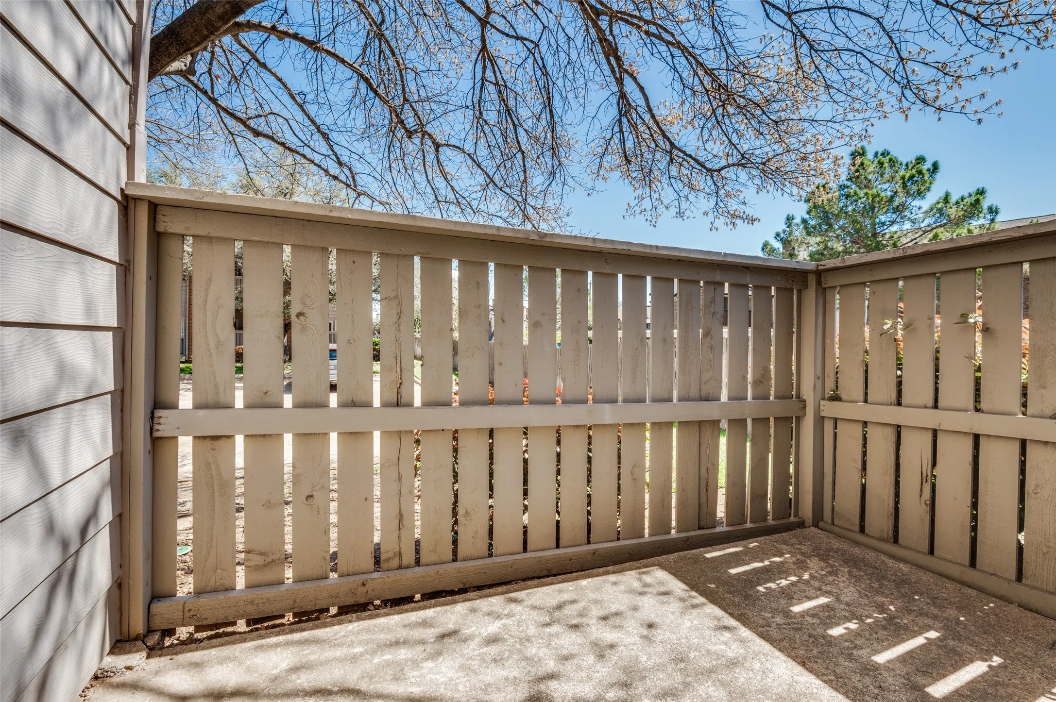 Uncovered secondary patio located off of primary bedroom