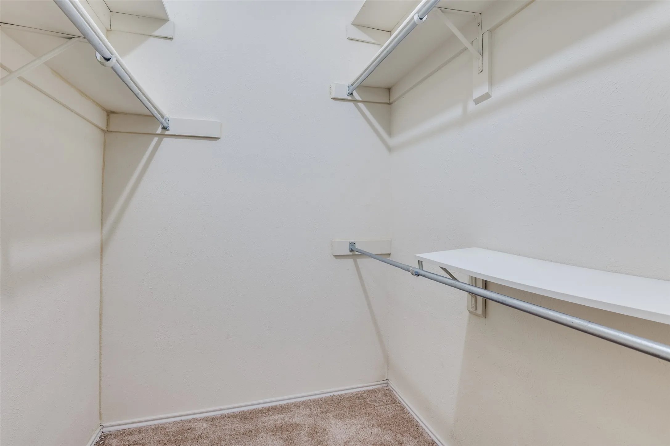 Secondary bedroom's walk-in closet
