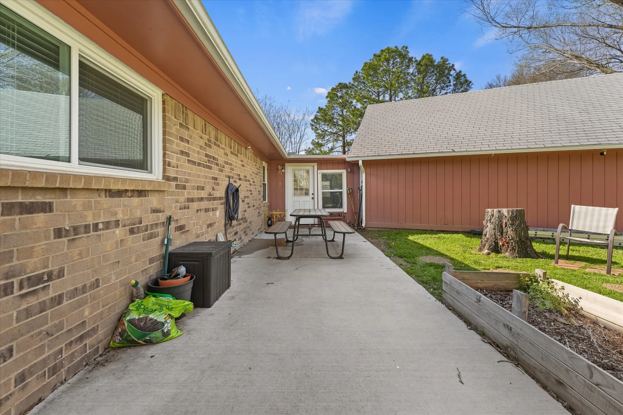 Private backyard patio with plenty of space for outdoor dining, entertaining, or relaxing. Ideal for BBQs, gatherings, or quiet evenings at home.