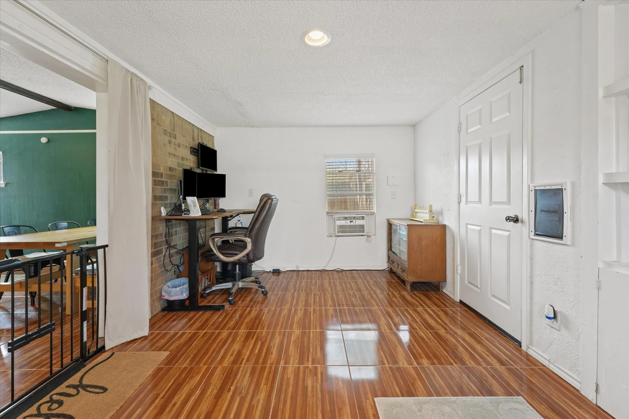 Versatile bonus room perfect for home office, playroom, workout space, or second living area.