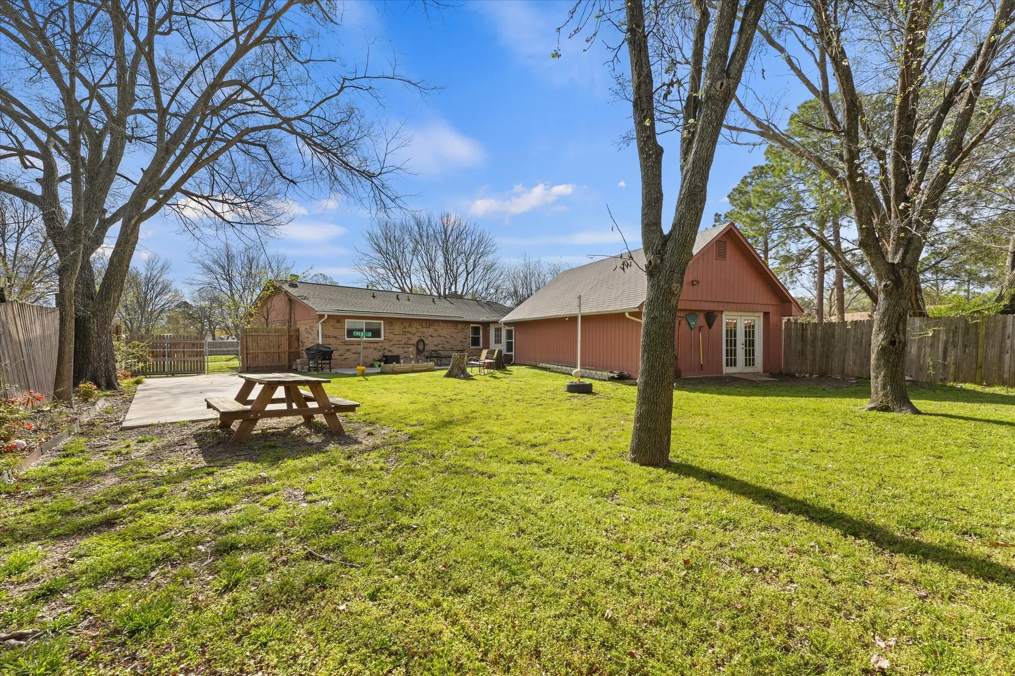 Oversized backyard with mature trees, open green space, and room to play, garden, or add a pool. Rare large lot offering privacy and flexibility.