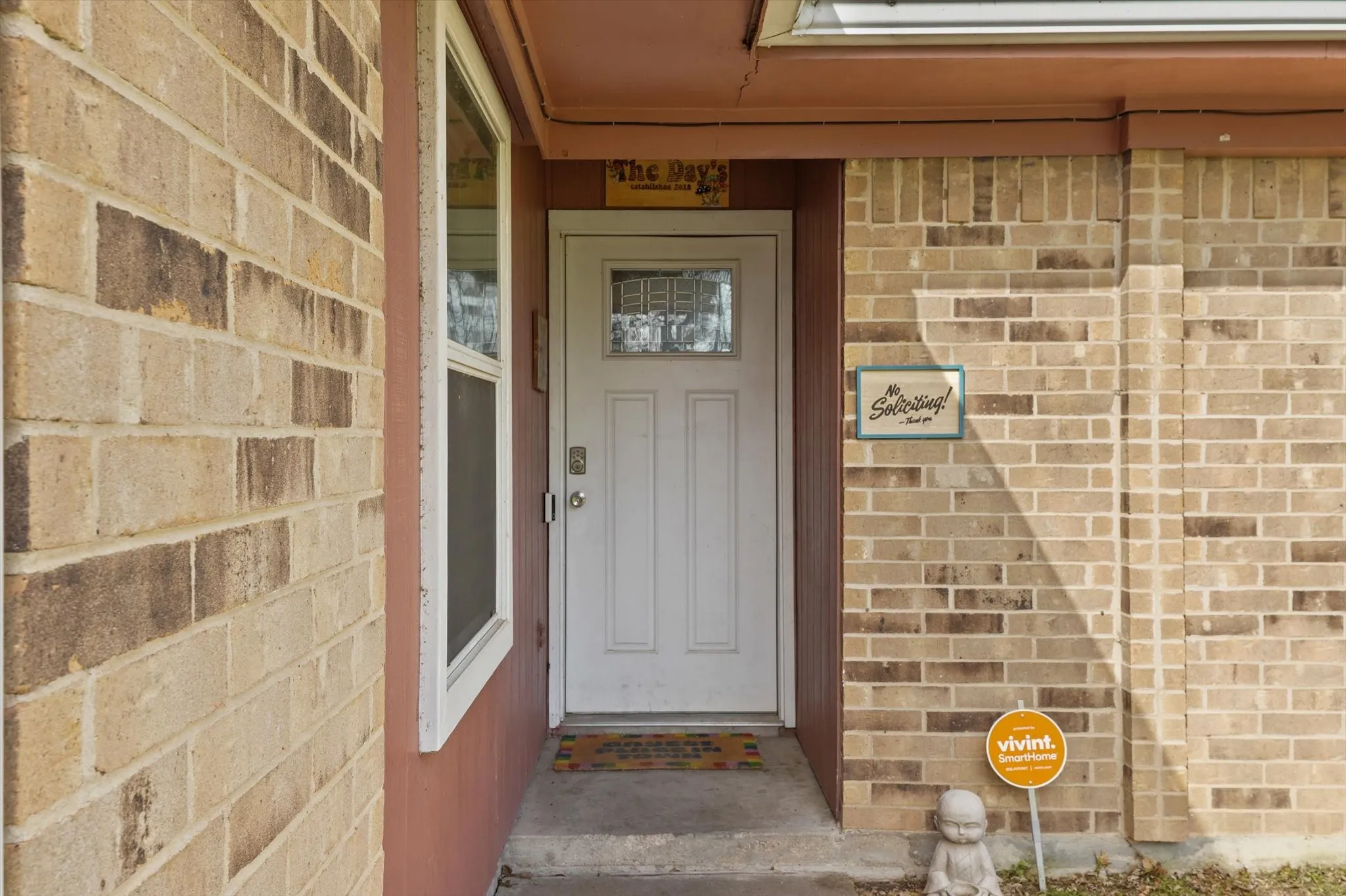 Covered front porch entry providing a welcoming and functional outdoor space.