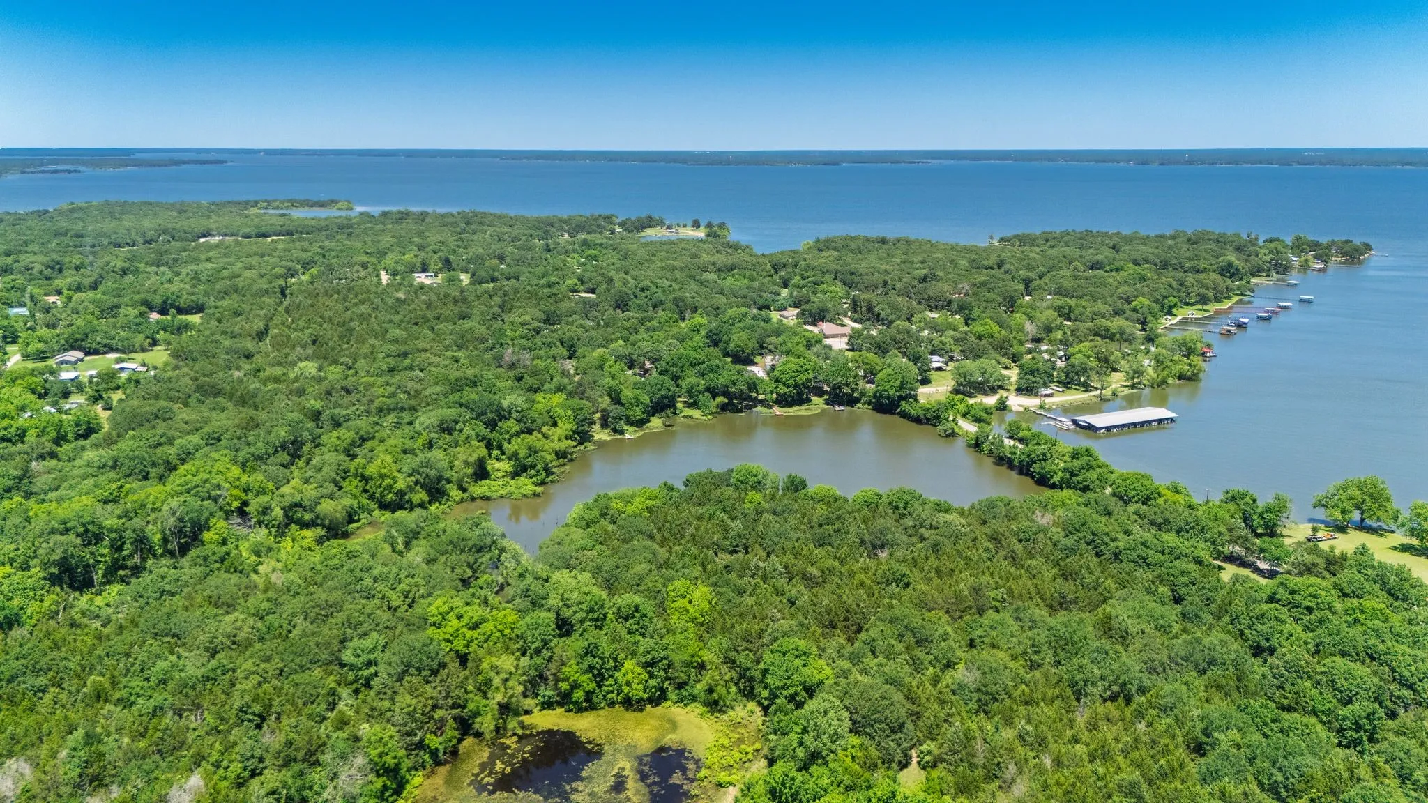 Aerial view shows proximity of the lake cove to the deeded pond!