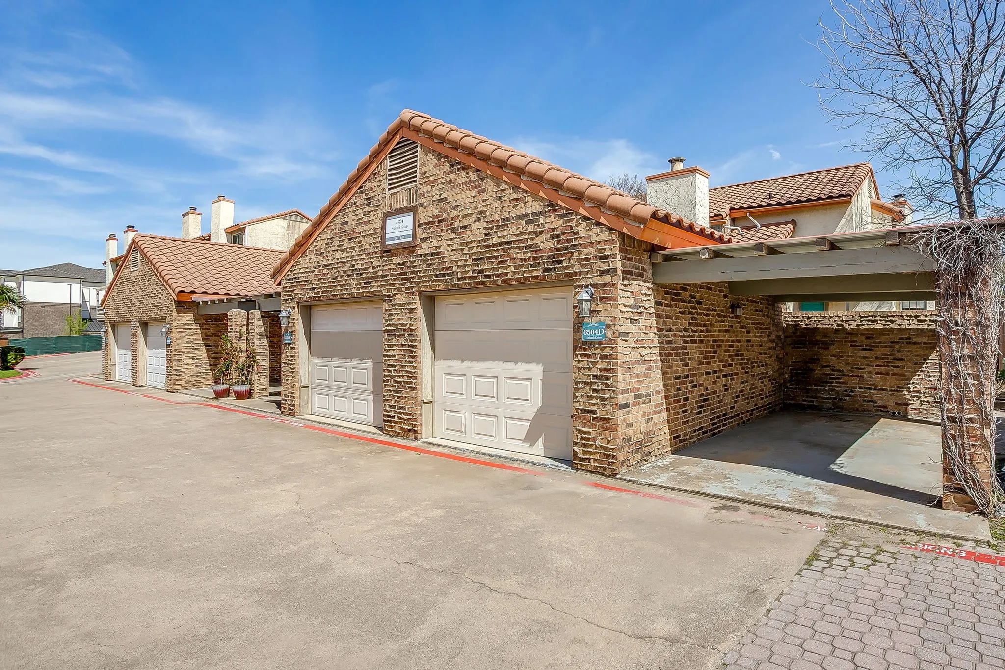 Designated garage space and covered carport space