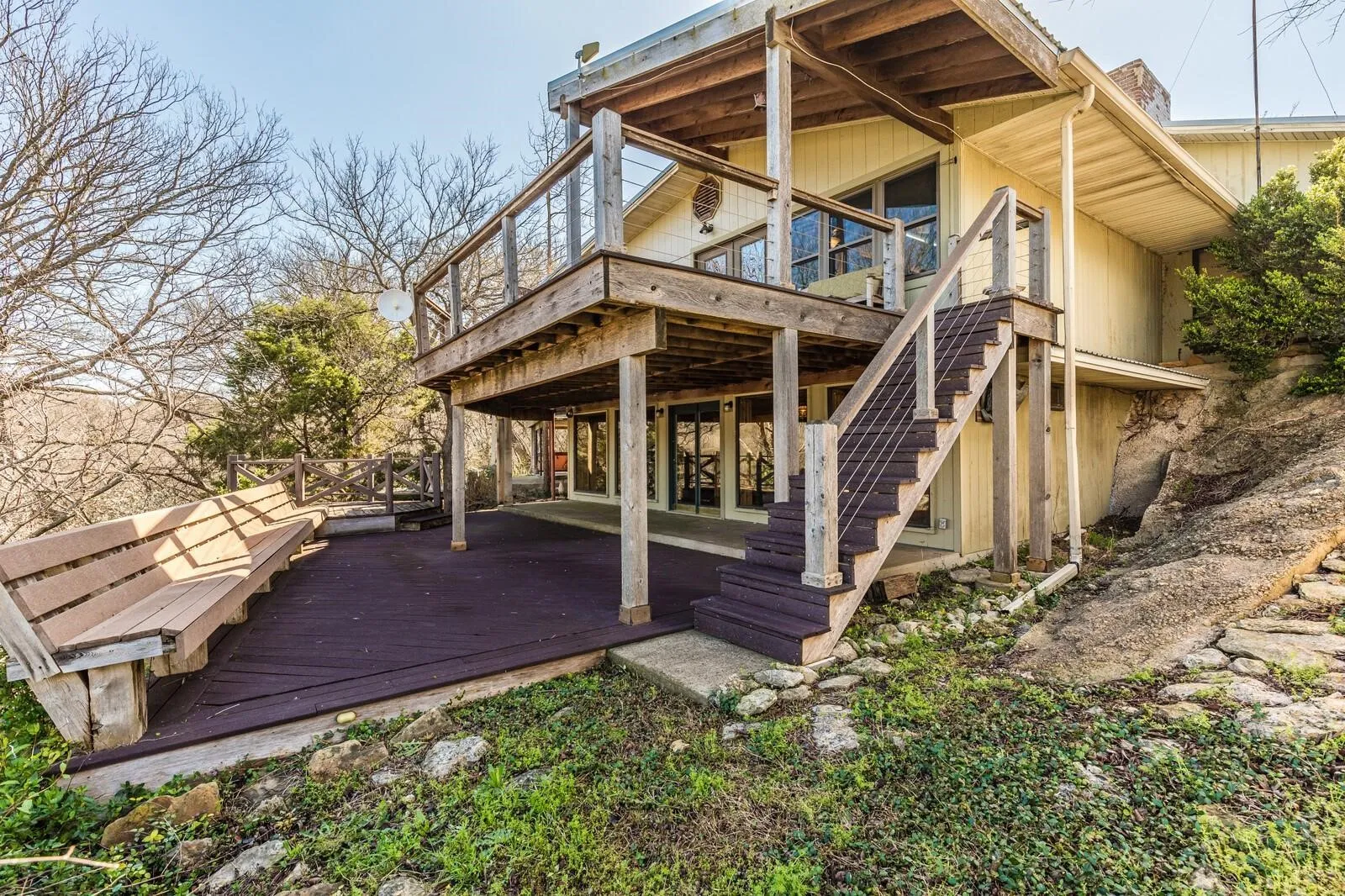 Rear faces toward lake. Lower level bonus room, opens to trex decking. Stairs lead up to trex deck into Great  room