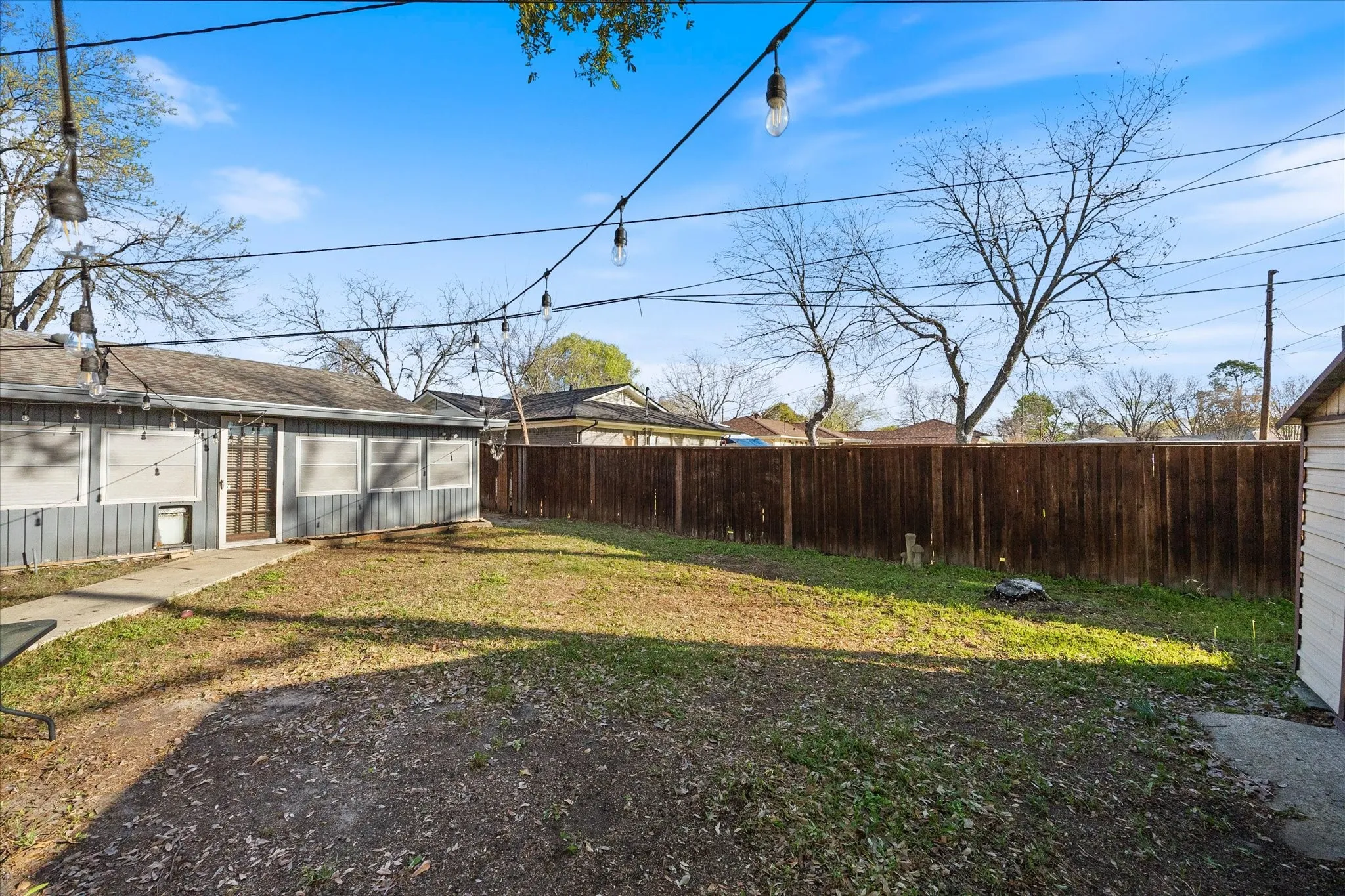 View of fenced backyard